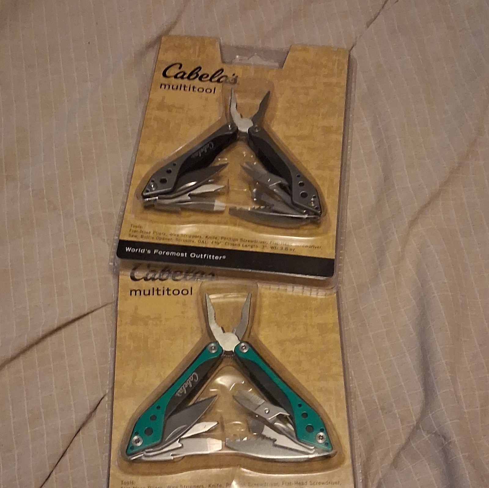 Cabela’s Multitool 7-in-1 Stainless Steel Black-Green Teal w/ Sheath