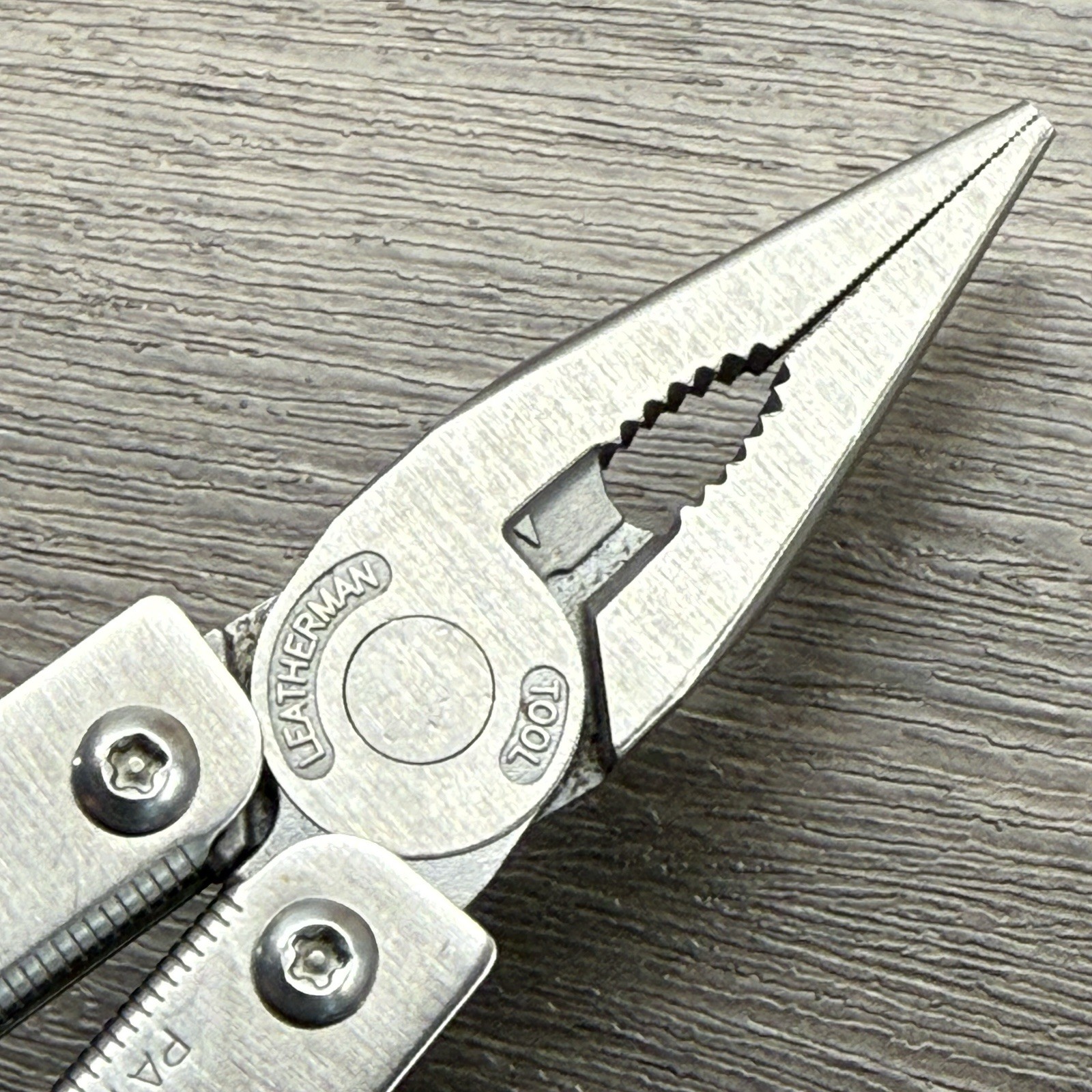 Leatherman Sideclip multitool. Lightly used. Late Run: shiny factory polished