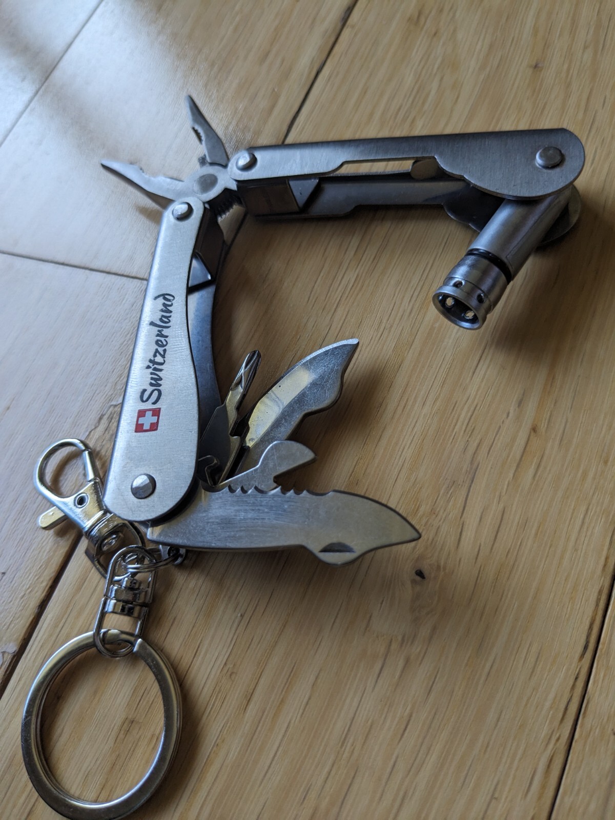 Swiss-Made Foldable Pocket Multi-Tool Stainless Steel w Pocket Clip. 8 Functions