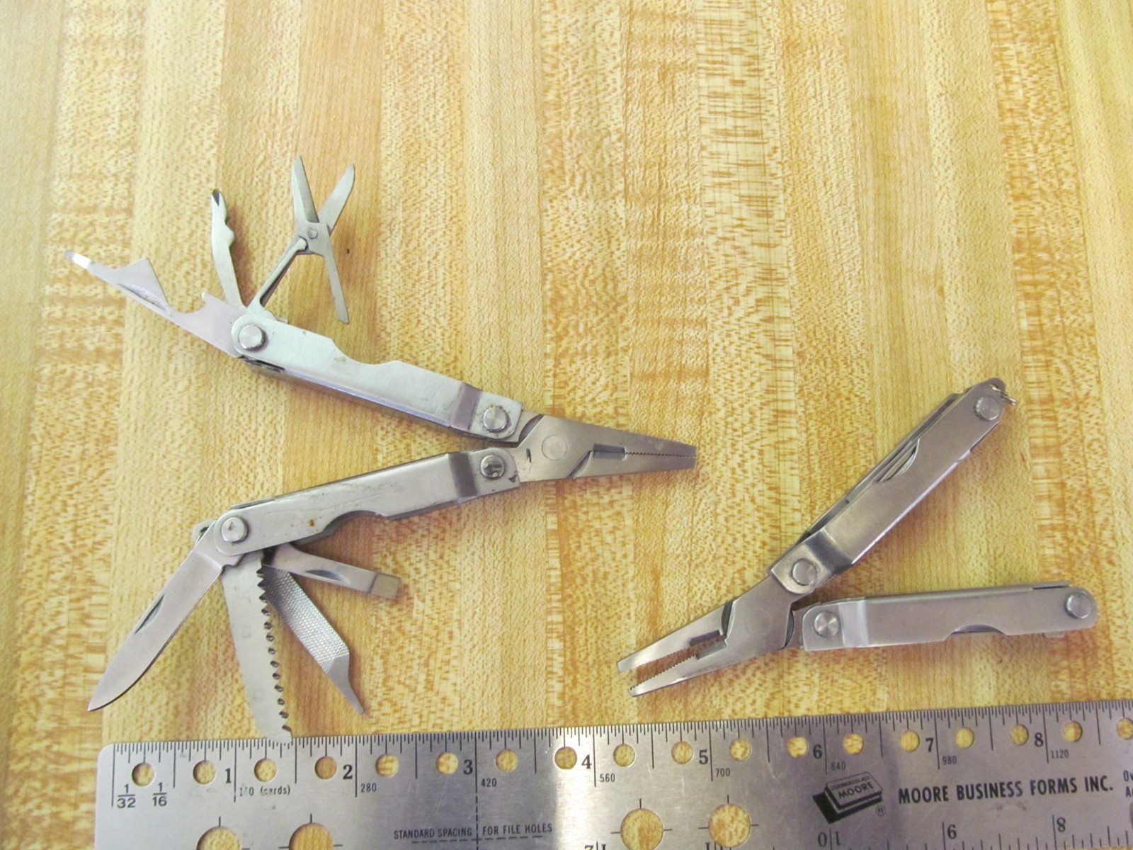 Lot of 8 Various brands inc. Winchester and Coast Multi Tools