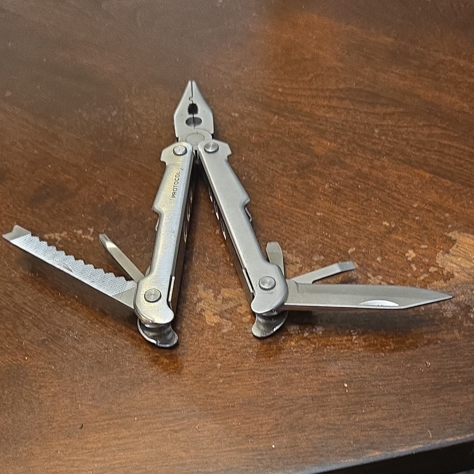 Protocol Stainless Steel 10-in-1 Multi-Tool Pliers Knife Saw Screwdrivers Silver