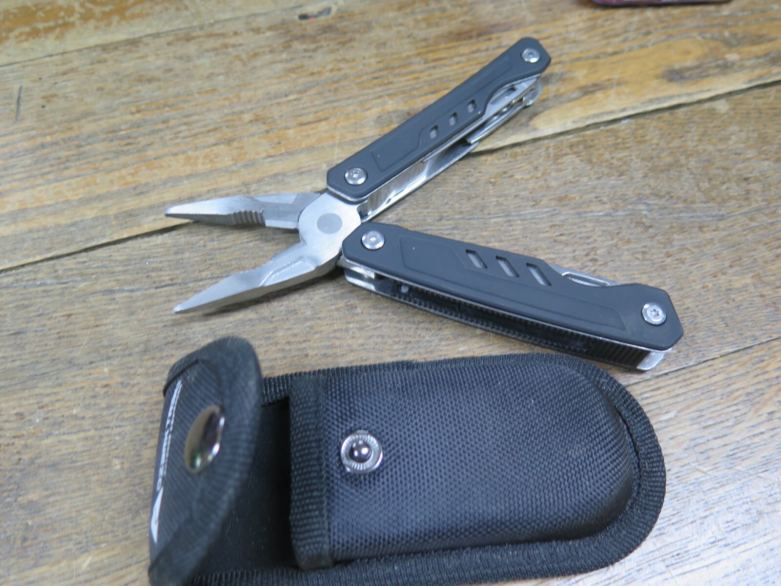 Ozark Trail Multitool Spring Loaded Pliers BLACK HANDLE WITH SHEATH