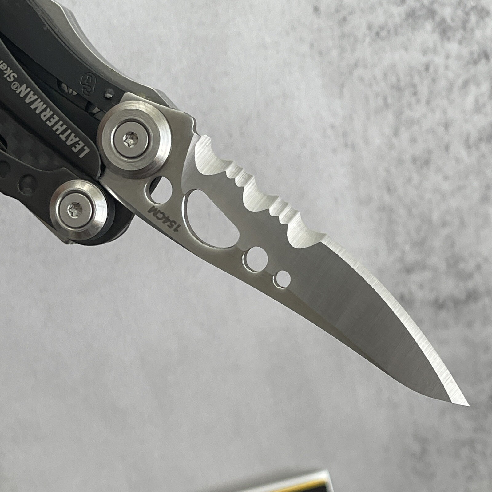 Early Leatherman Skeletool CX Carbon Fiber Handle Insert & Half-Serrated Blade