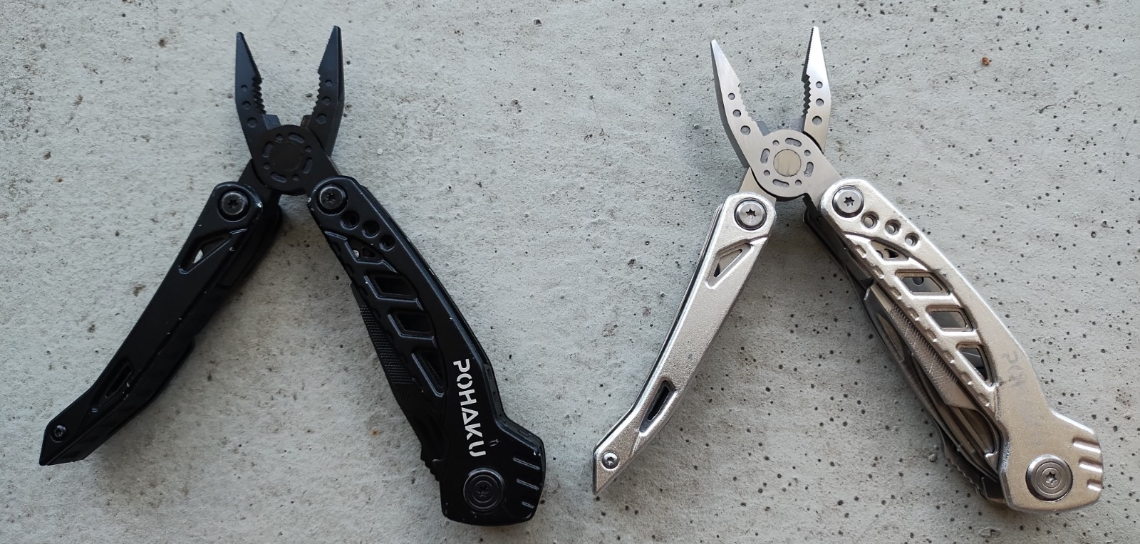 POHAKU BLACK & SILVER MULTI TOOL PLIERS KNIFE, SAW BLADE, FILE, ETC. LOT OF 2