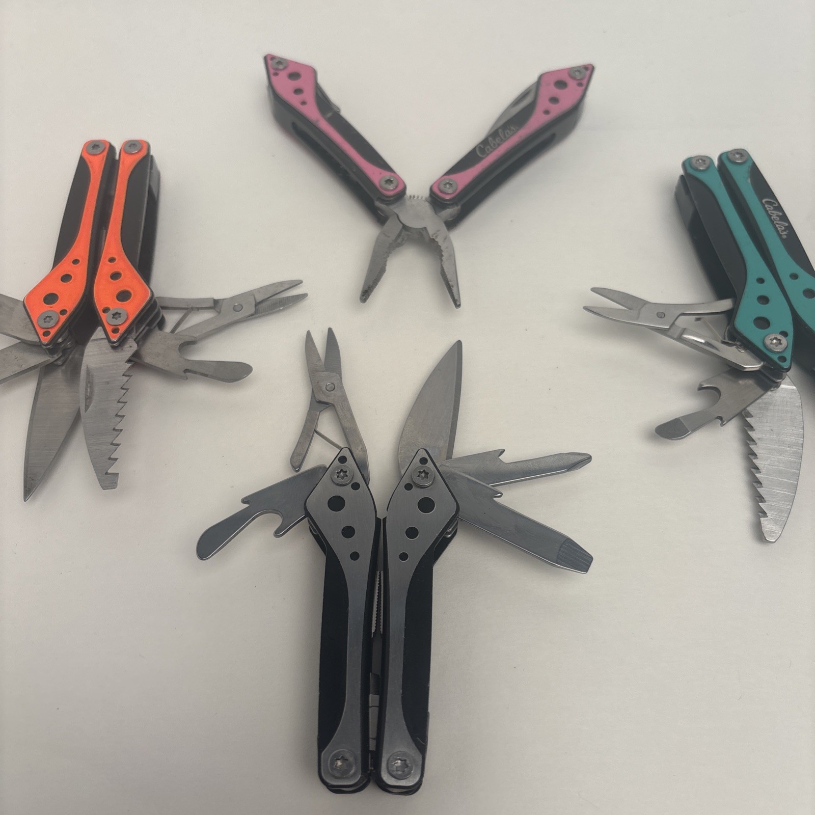 Cabela’s LOT of 4, Orange Teal Silver Pink Small Multi-Tool Camp Hike Hunt Fish