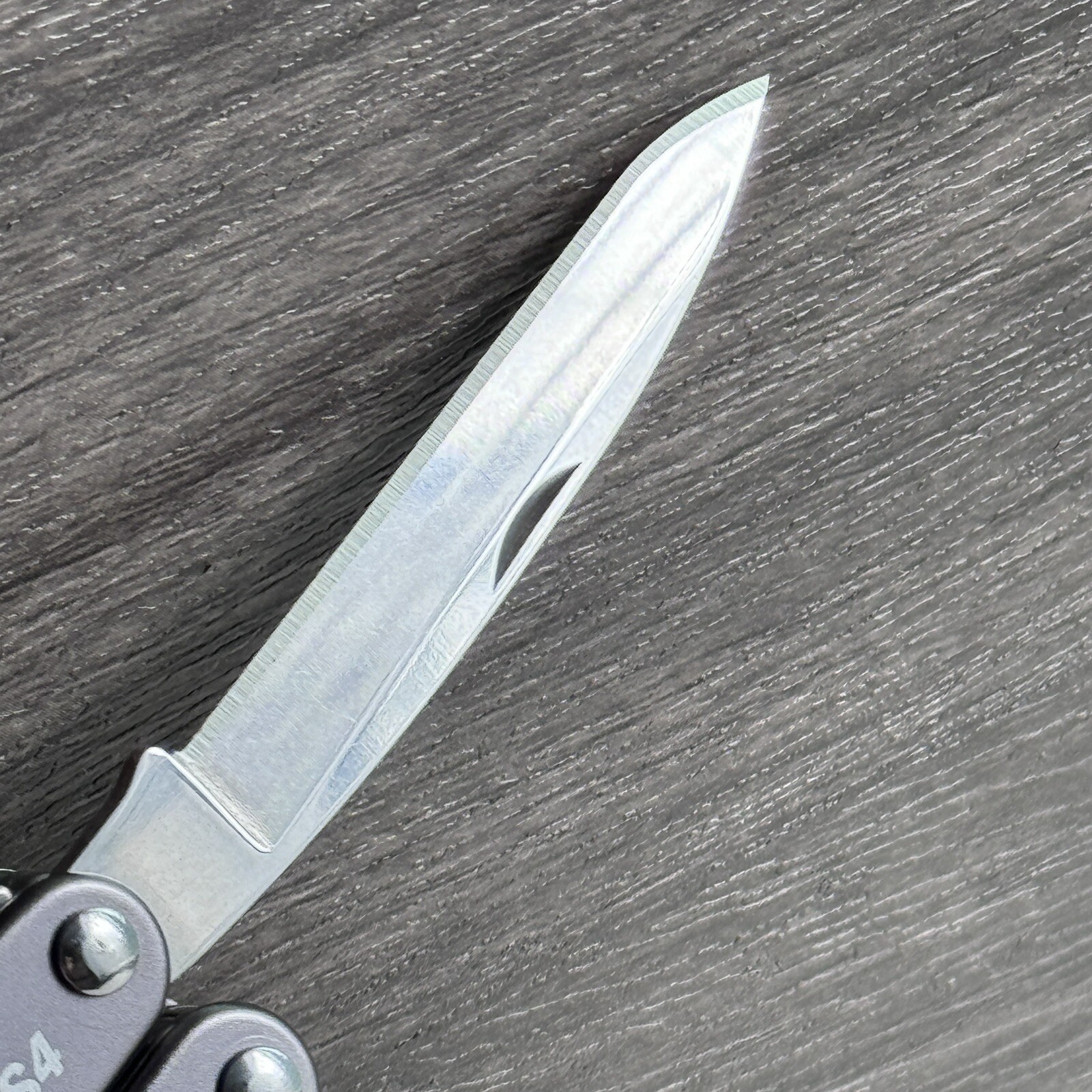 New, Early Leatherman Juice CS4 Storm Gray multitool.