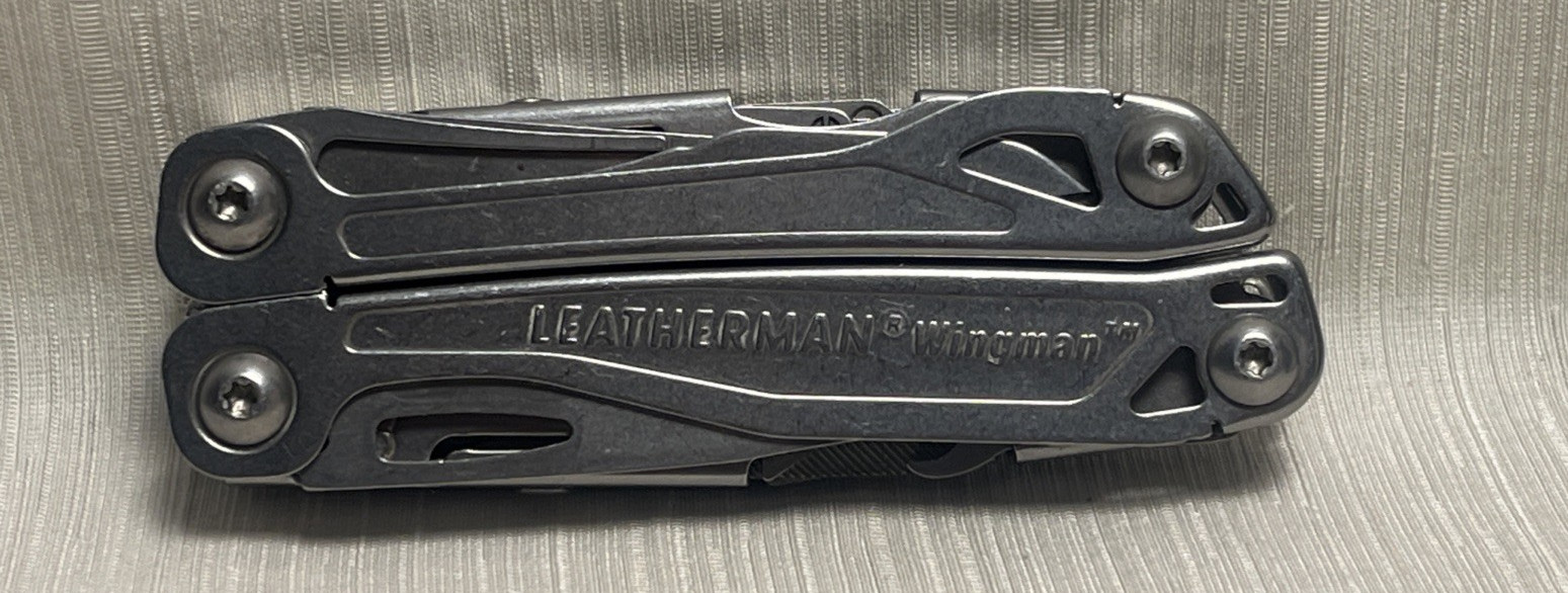 Leatherman Wingman Multi Tool W/Clip and Nylon snap case Dated 05/14