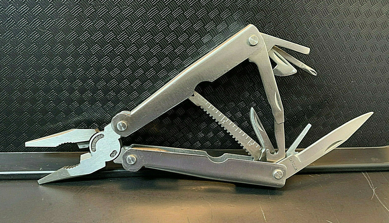 pocket multi tool + new with sheath.