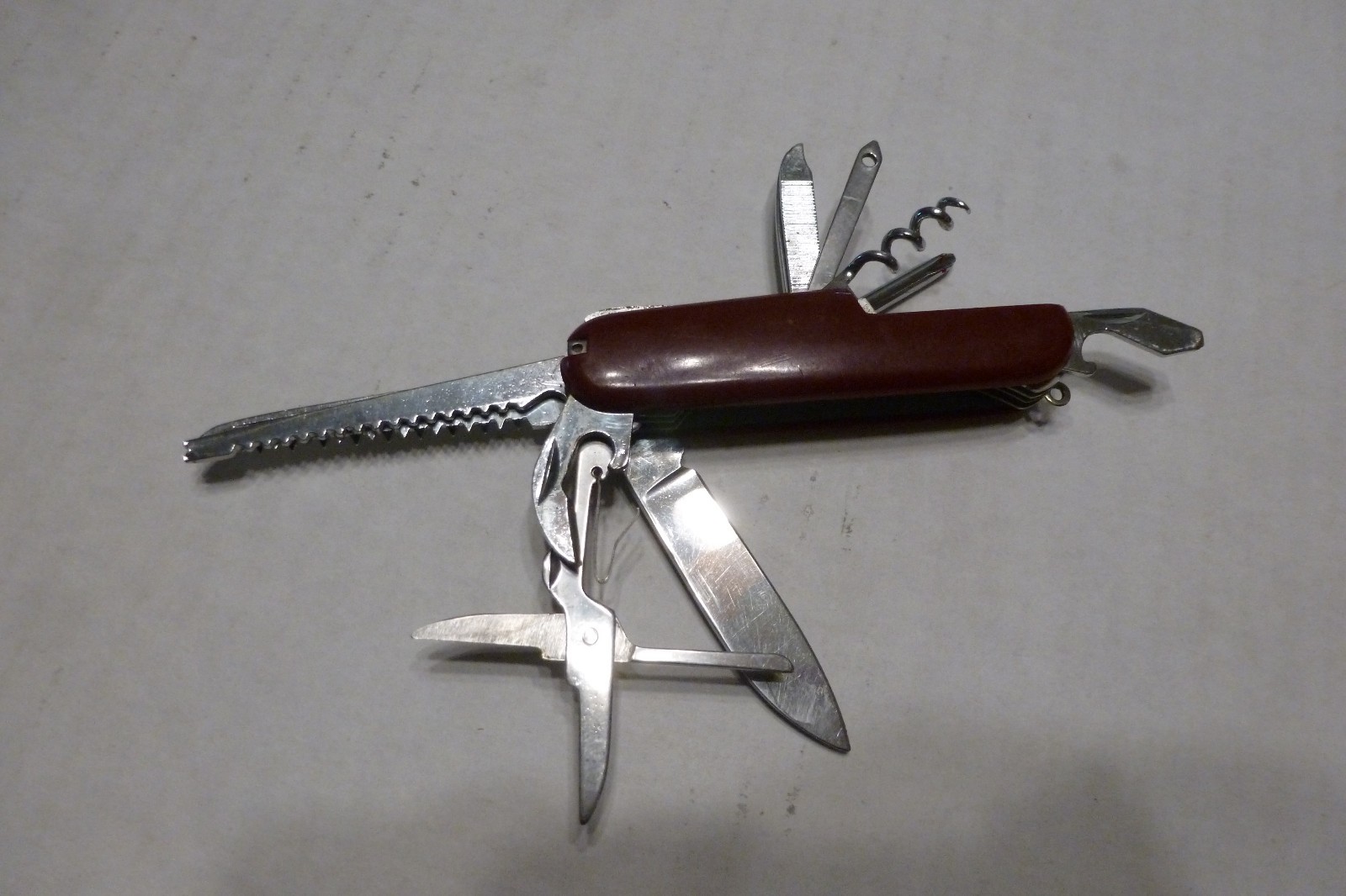 Multi Tool Knife With Scissors Screwdriver Openers Blades Corkscrew Tight