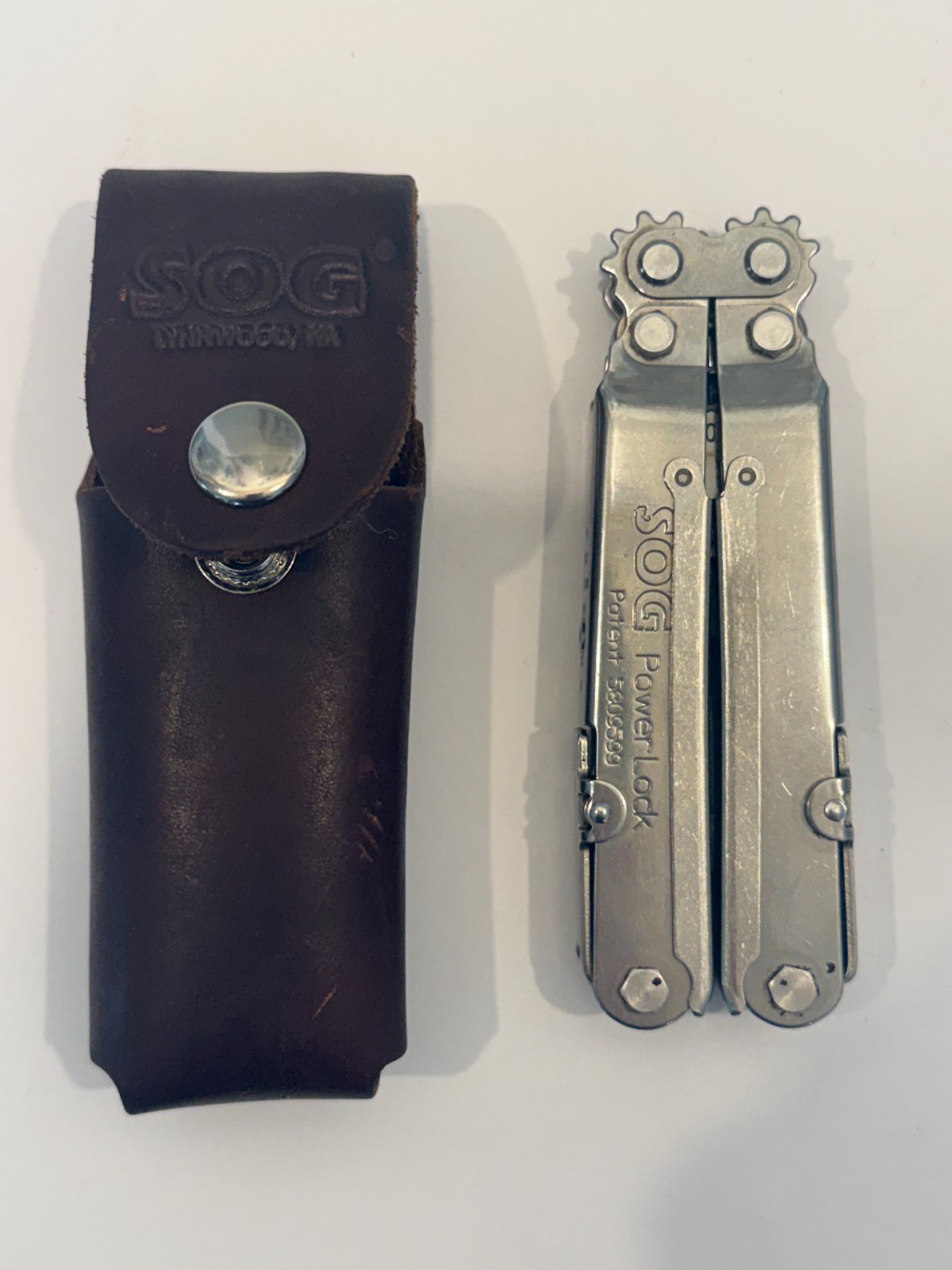 SOG PowerLock Stainless Multi-Tool Patent 5809599 w/ Leather Sheath