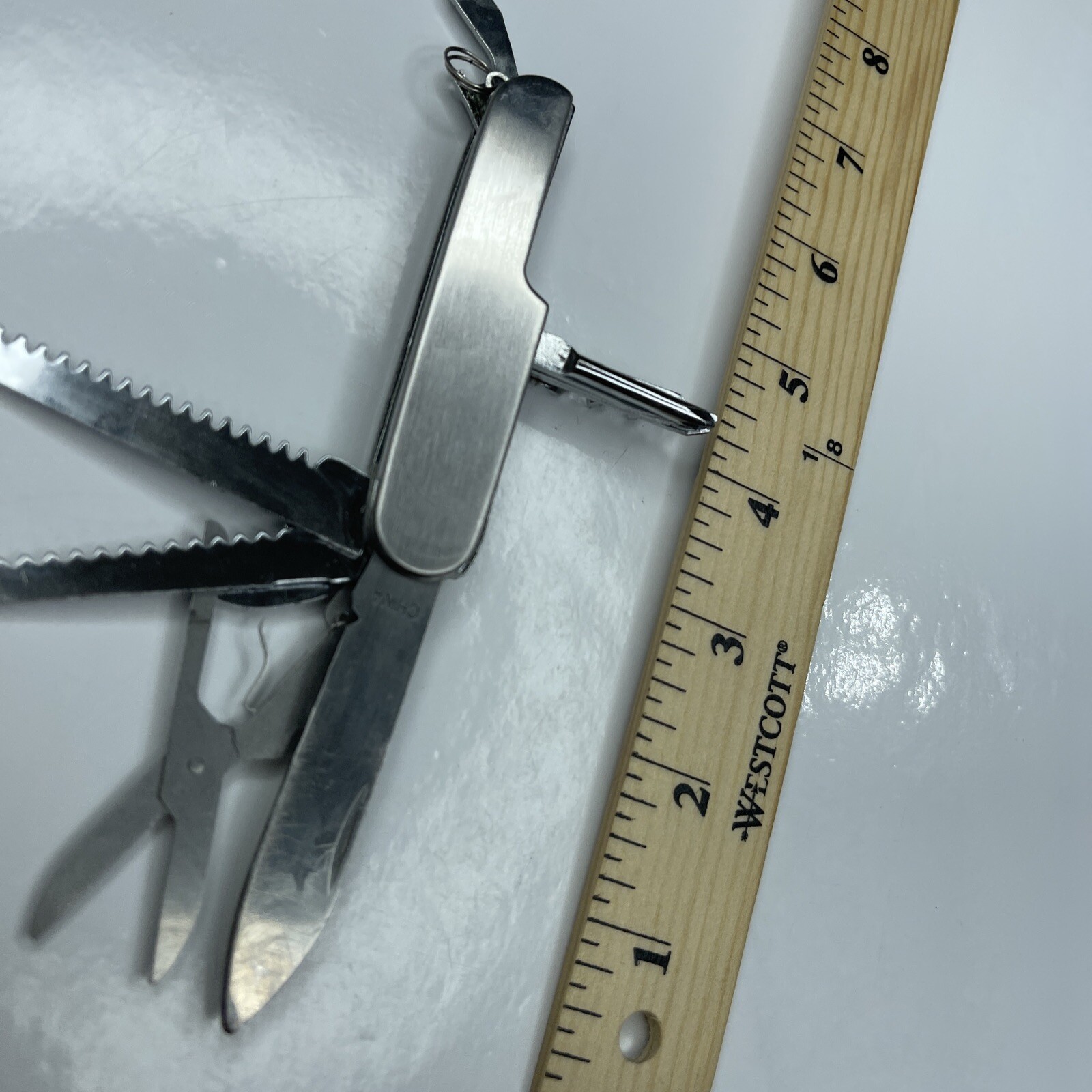 A Silver Tone Folding Utility Pocket Army Knife Stainless Scissors Cork Opener
