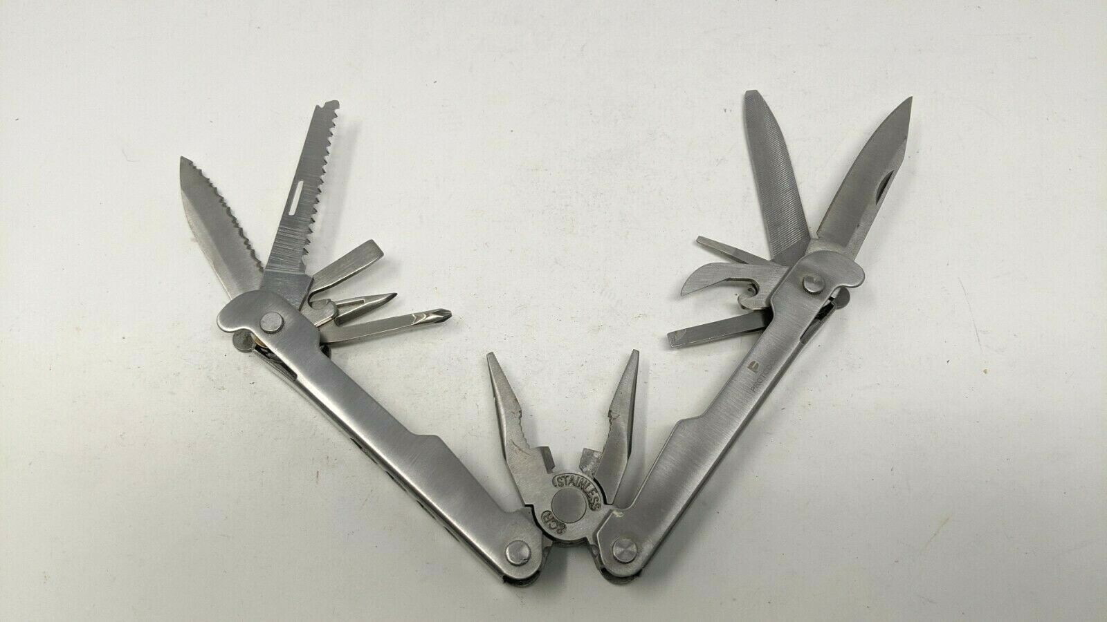 Protocol 14 In 1 Multi Tool Wrench-in-Handle Pliers Saw File Fish Scaler Ruler