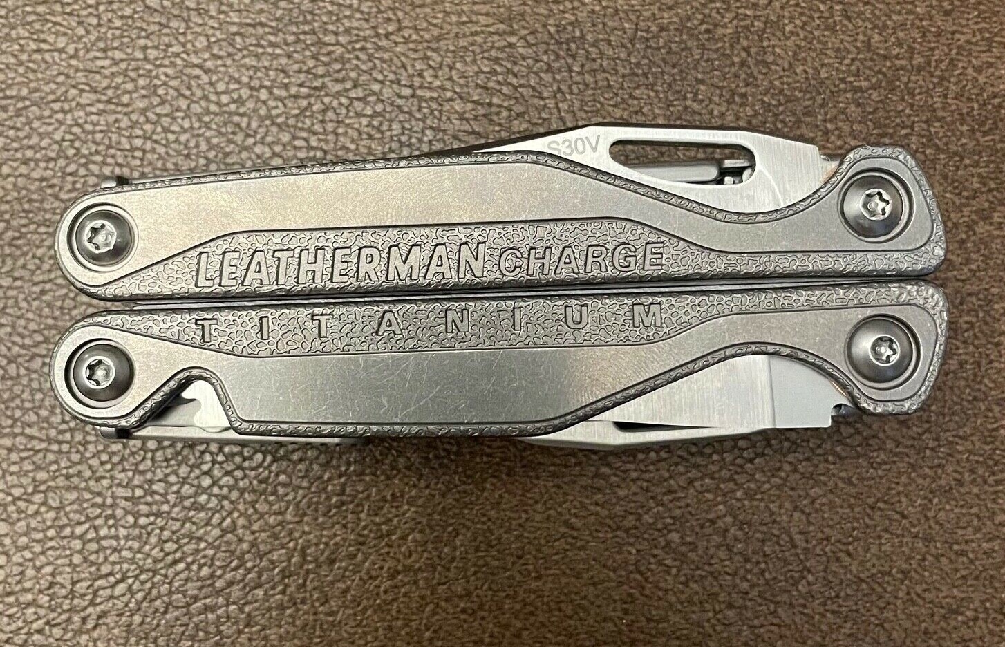 NEW parts from a Leatherman Charge+ TTI Titanium: One (1) Part for Mod or Repair