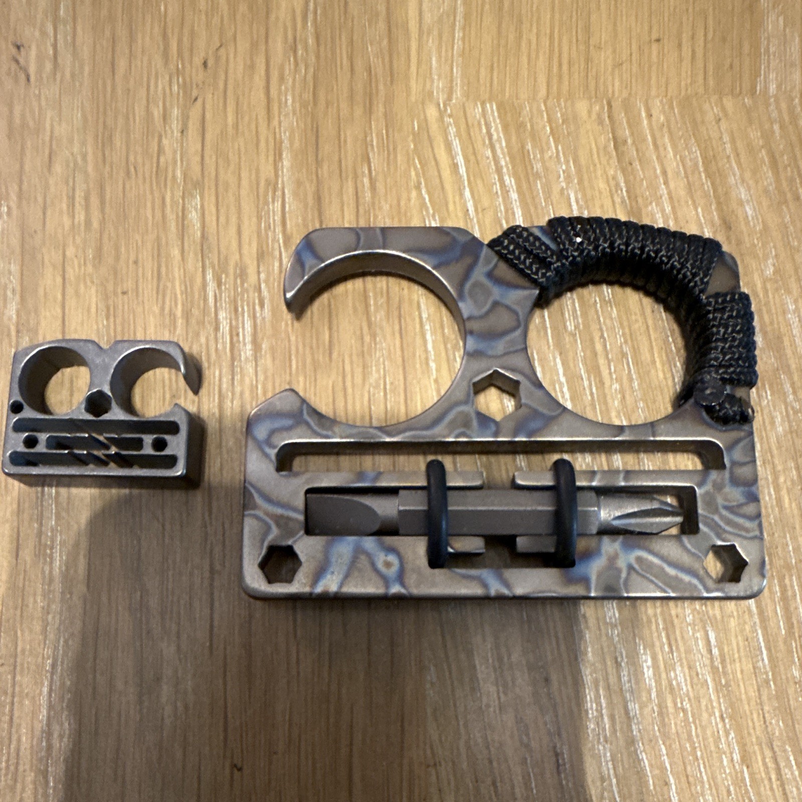Titanium LockJaw Compact flame-anodized DFK with matching Titanium bead