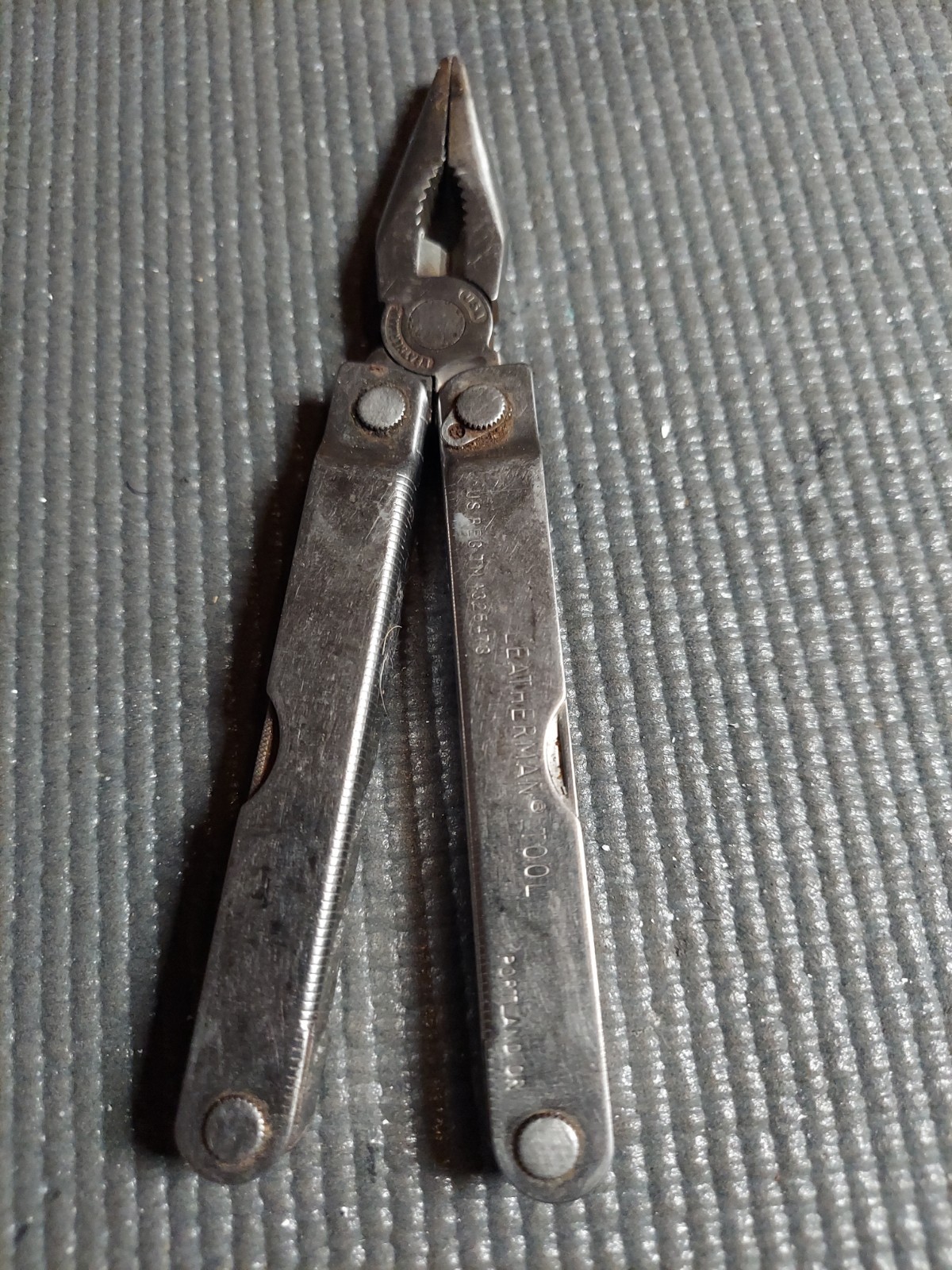 Original vintage Leatherman multi-tool, U.S. registered trademark (TM 1325473).