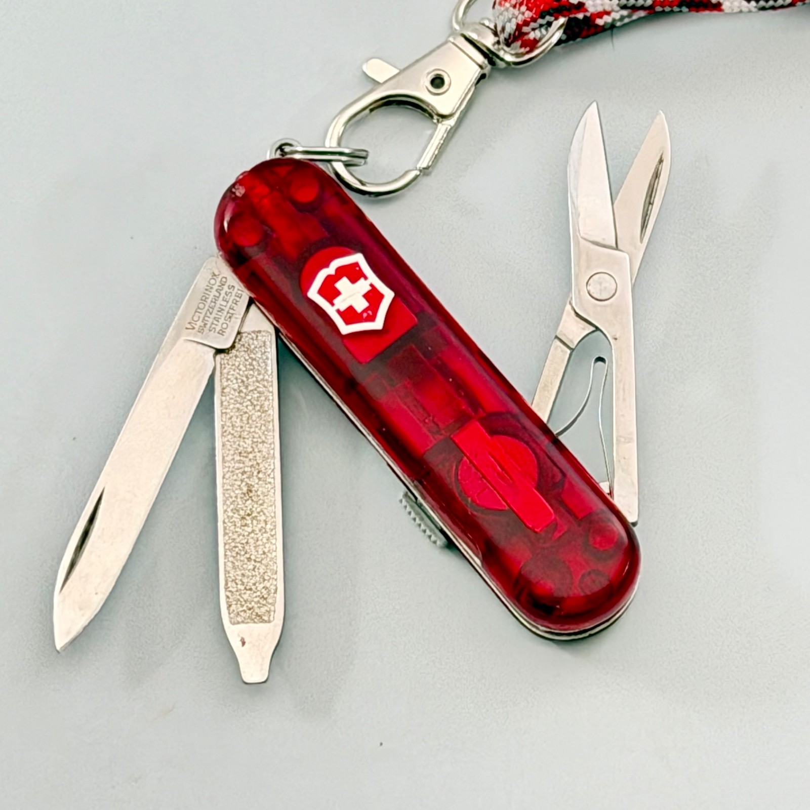 Tranparent Red Swiss Army Knife Signature Lite/ Red LED/Refreshed/New Battery