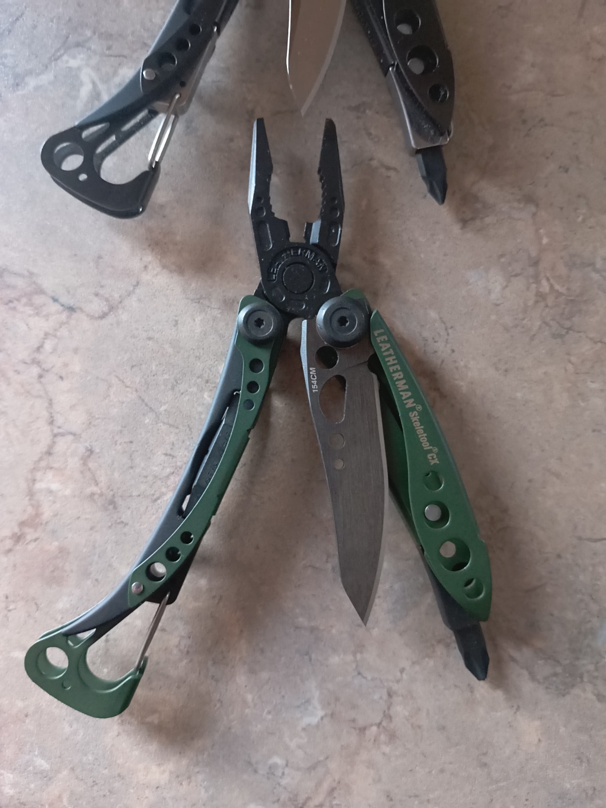 Leatherman Skeletool CX Plain Edge Knife 154CM Lot Od Green/Black Stainless