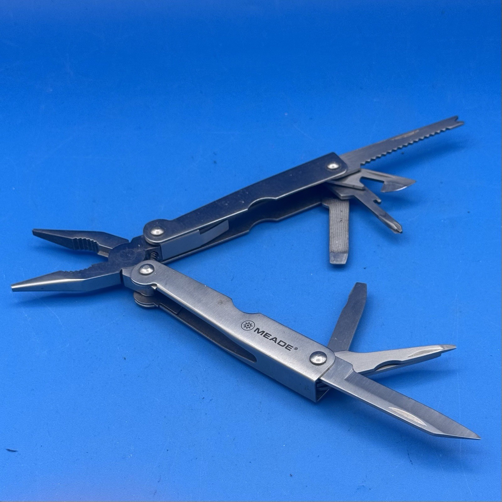 7-in-1 Meade Multi Tool Pliers Knife Saw File Screwdrivers EDC Tool