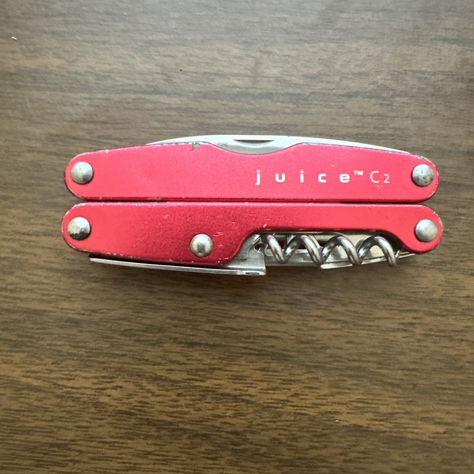 Retired Red Gen 1 Pat pending Leatherman Juice C2 Multitool w/nylon pouch.