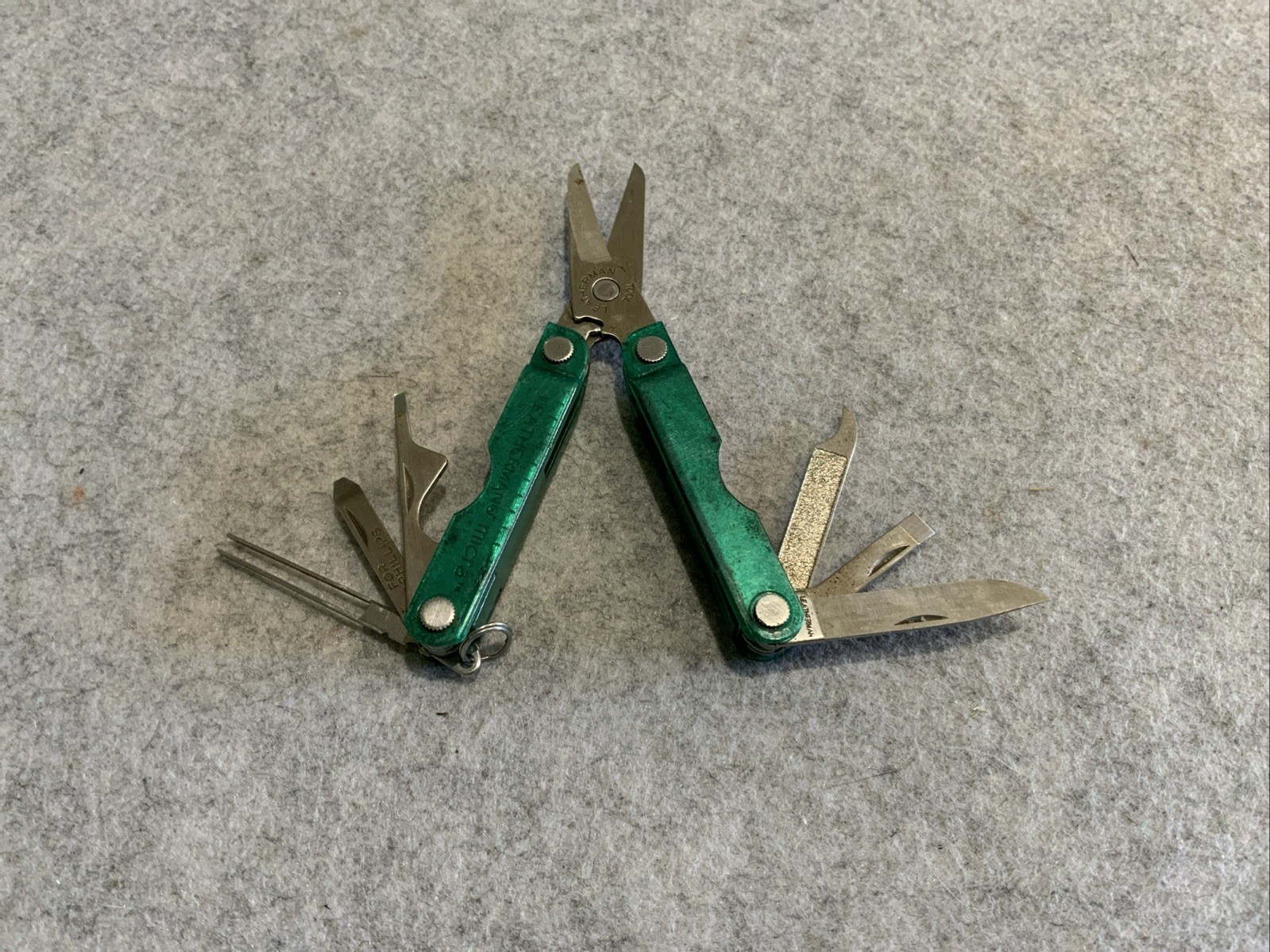 Leatherman Micra Multi Tool Green Transparent Plastic Coating Scissors Knife