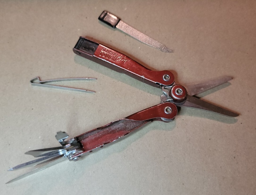 Red Schrade Tough Chip 10 In 1 Compact Multi Tool Screwdriver