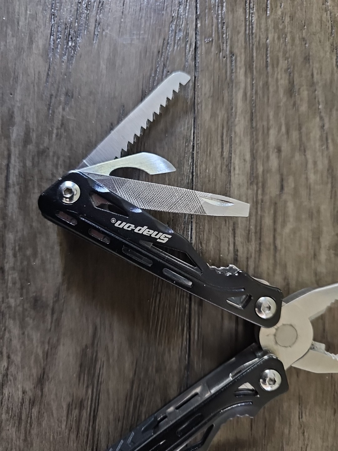 SNAP ON Multi Tool Knife Pliers Saw Screw Driver Bottle Opener File Black