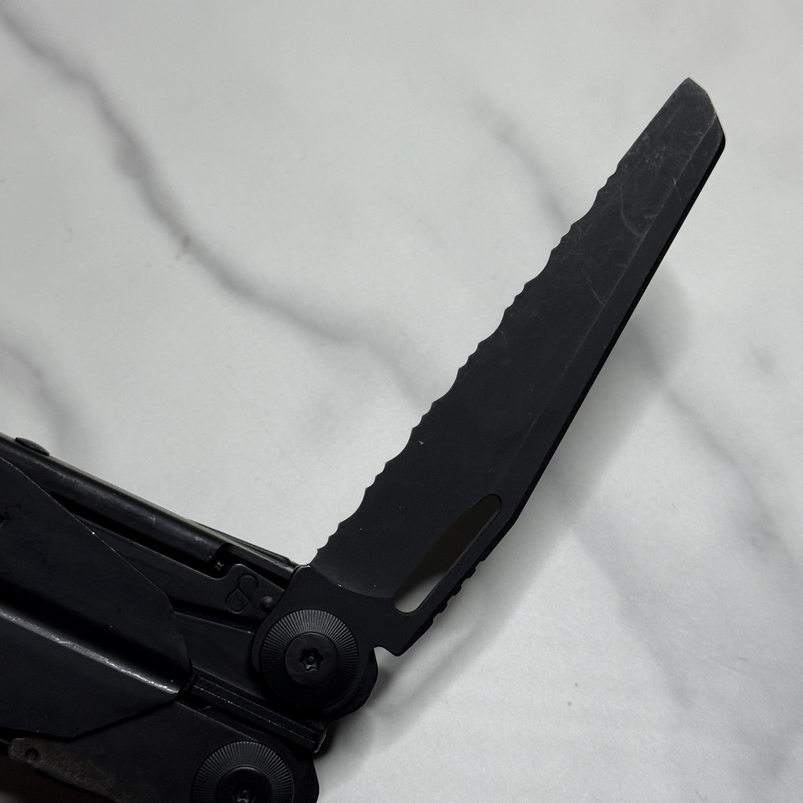 Leatherman Surge Cap Crimper Black Multitool w/Molle Sheath. Discontinued