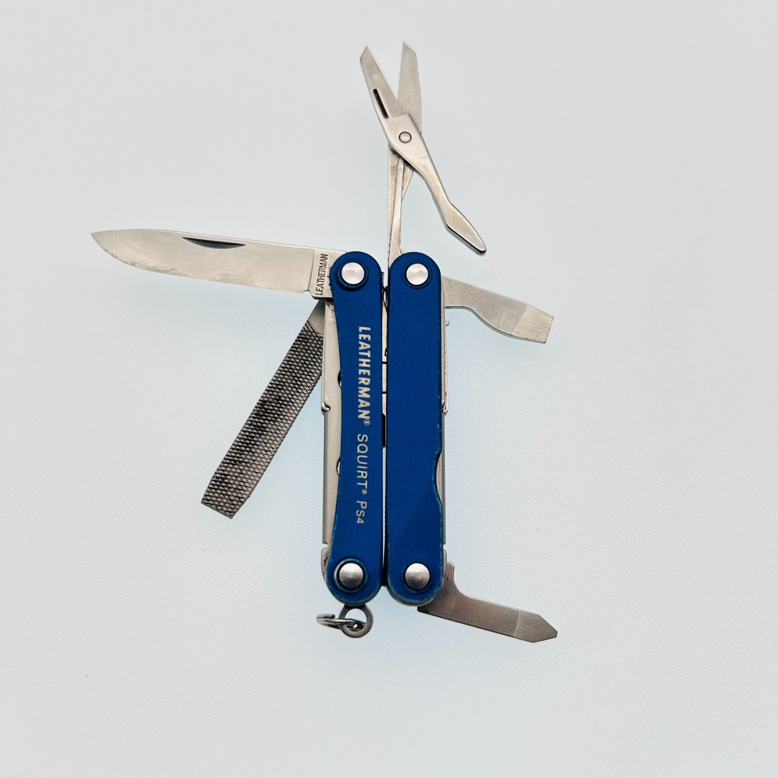 Leatherman Squirt PS4 BLUE – 8-in-1 Keychain Multi-Tool Discontinued (CODE58)