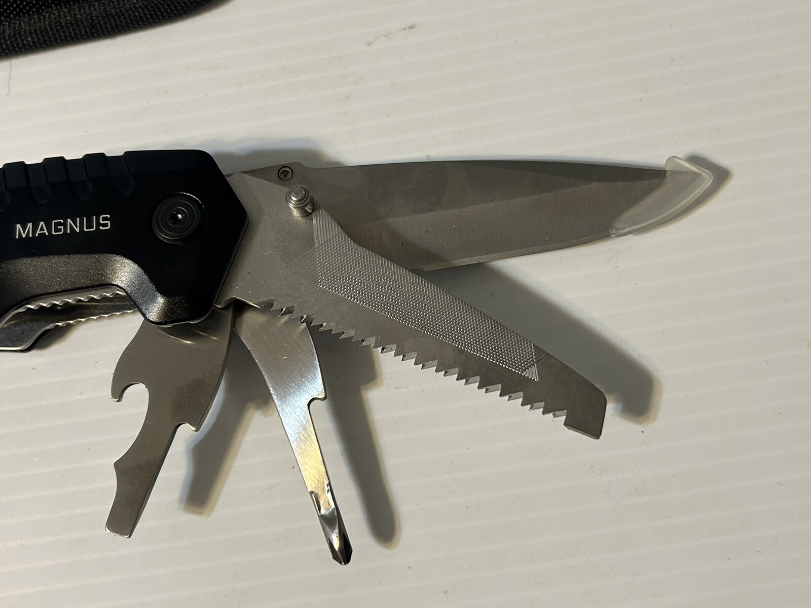 Kilimanjaro Magnus 9-in-1 XL Multi-Tool Folding with Snap Pouch New Never Used.