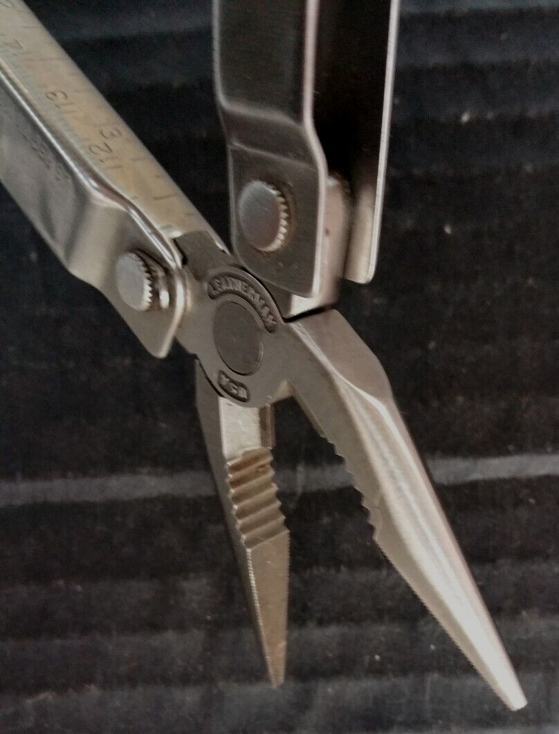Leatherman Multi Twelve Tool Stainless 4″ No Sheath 2.5″ Blade Excellent + 1985
