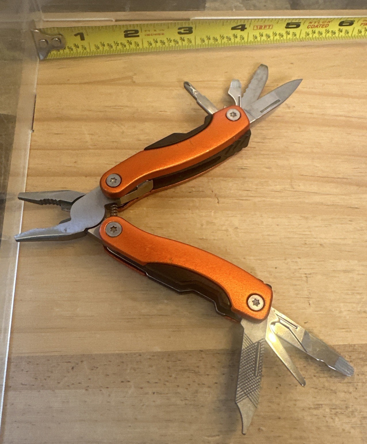 portable pocket multi-tool featuring spring-action pliers 2.75” Closed