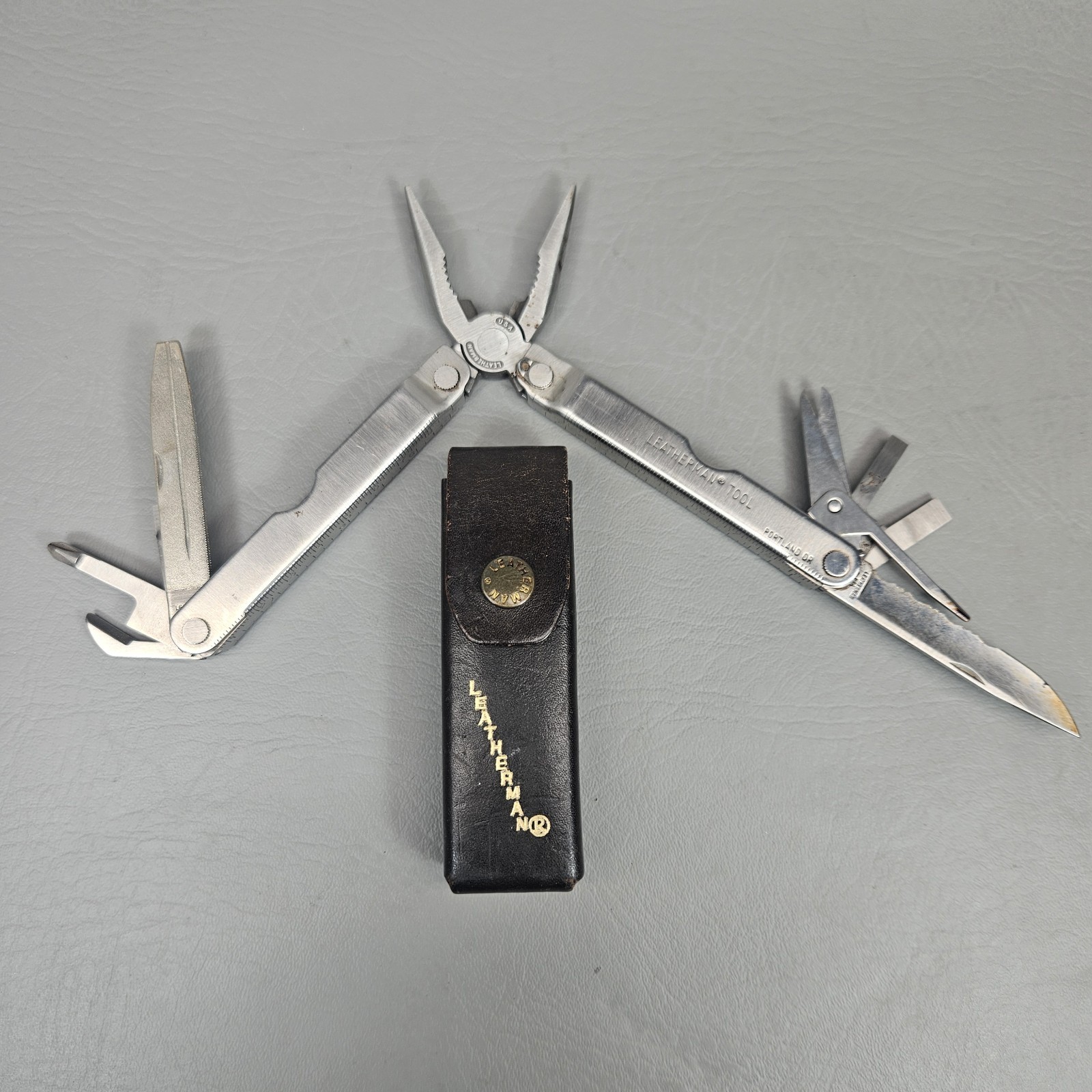 Vintage Leatherman Stainless Steel MultiTool Original Leather Sheath Portland OR
