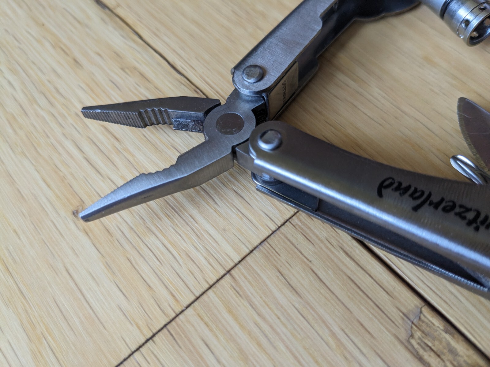 Swiss-Made Foldable Pocket Multi-Tool Stainless Steel w Pocket Clip. 8 Functions