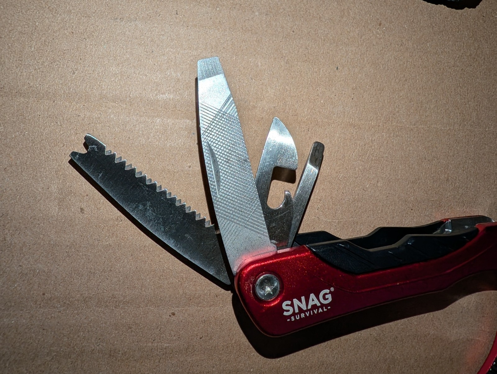 Snag Multi Purpose Tool. 10 Tools W/ Sheath