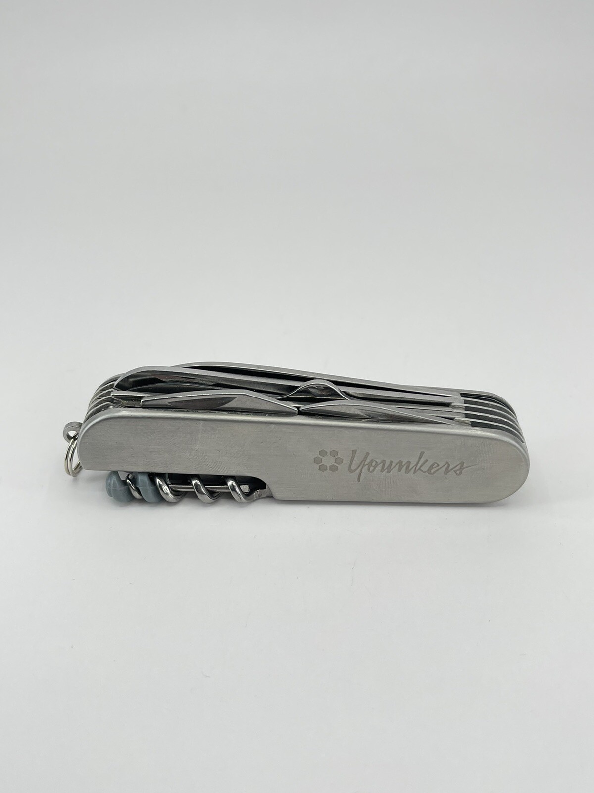 Younkers multi tool Pocket Knife can opener cork screw wood saw scissors file