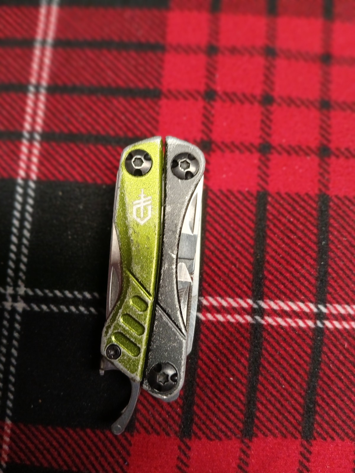 Gerber Green Dime has wear outside. Inside great!