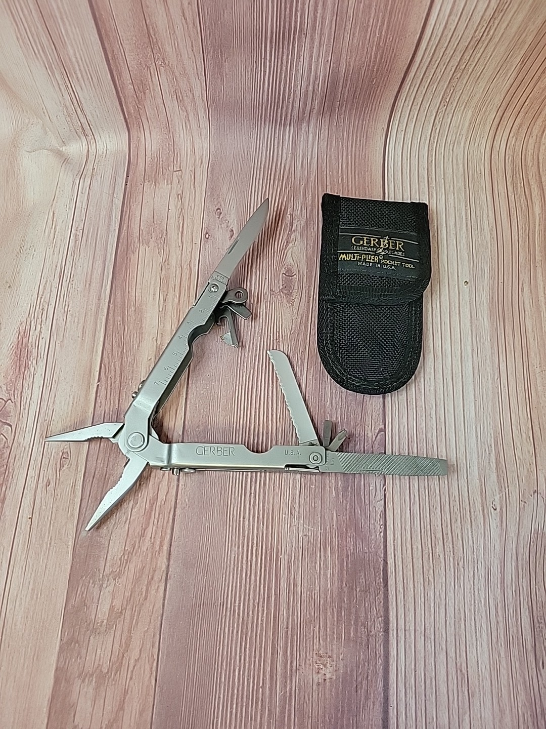 One Gerber MP600 Multi-tool Needle Nose With 8 Tools In One