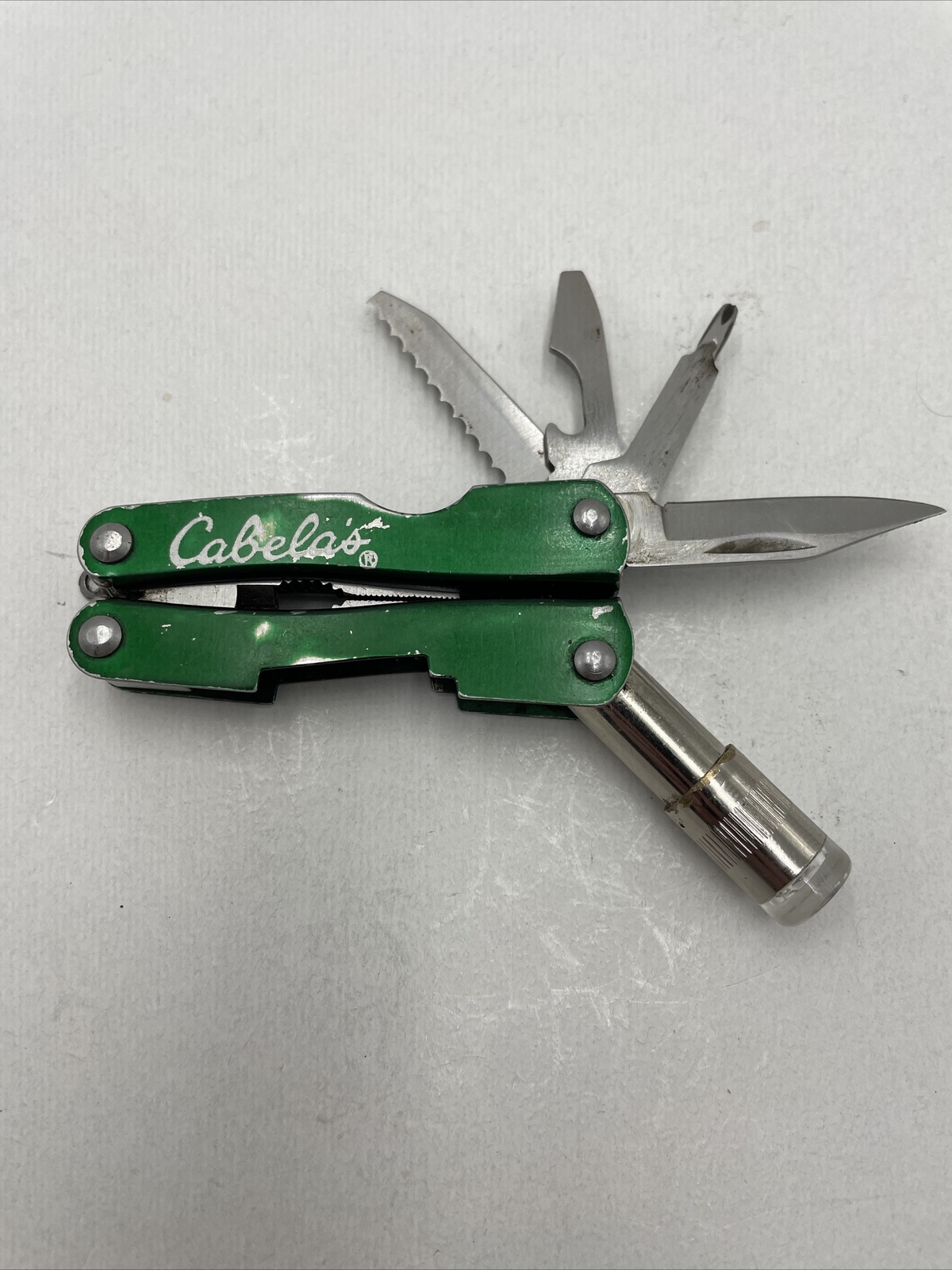 Cabela’s Mini Multi-tool w/ LED flashlight green