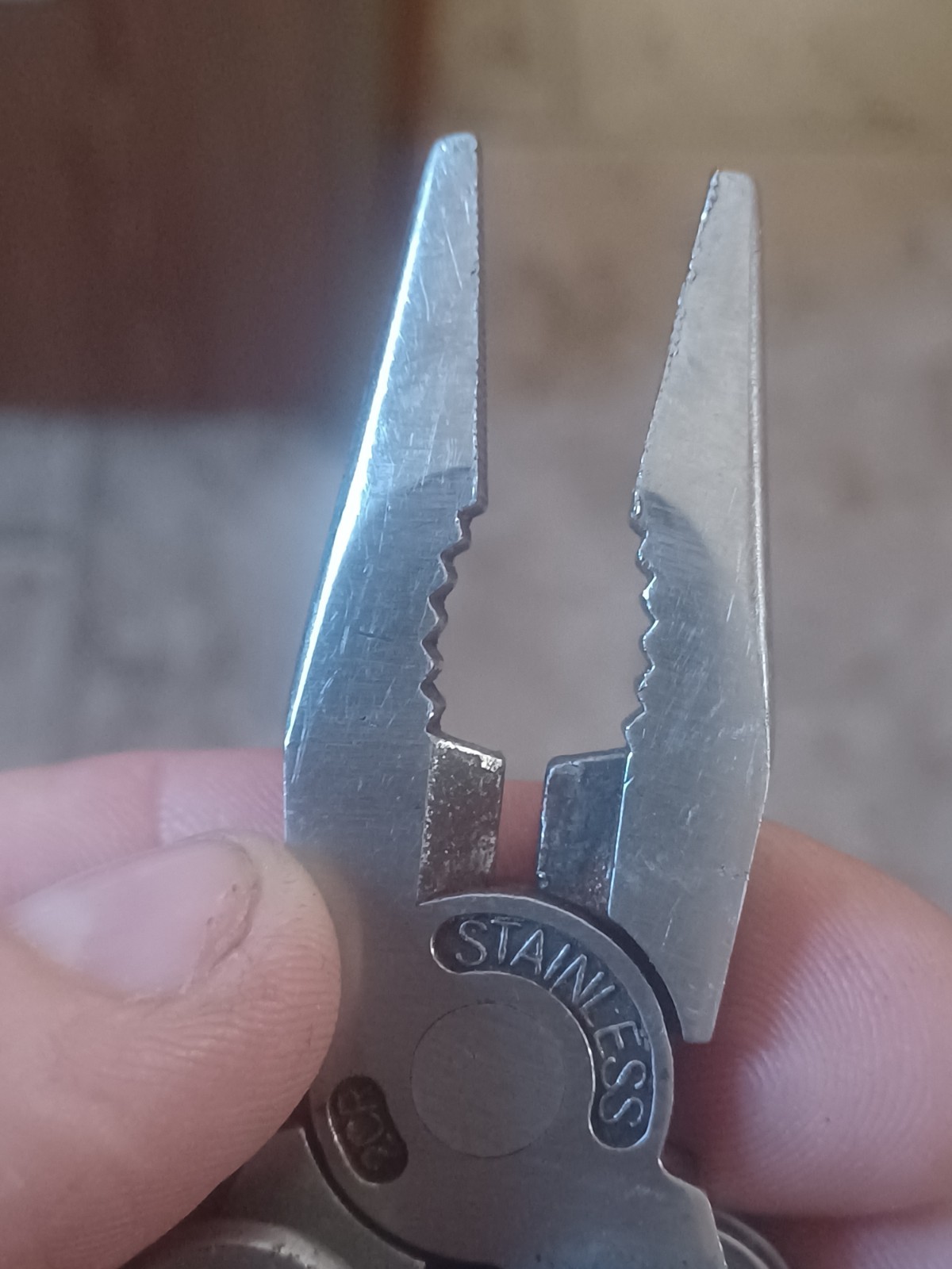 New and Used STANLEY -IN-1 STAINLESS STEEL MULTITOOL WITH BLACK POUCH (84-519)
