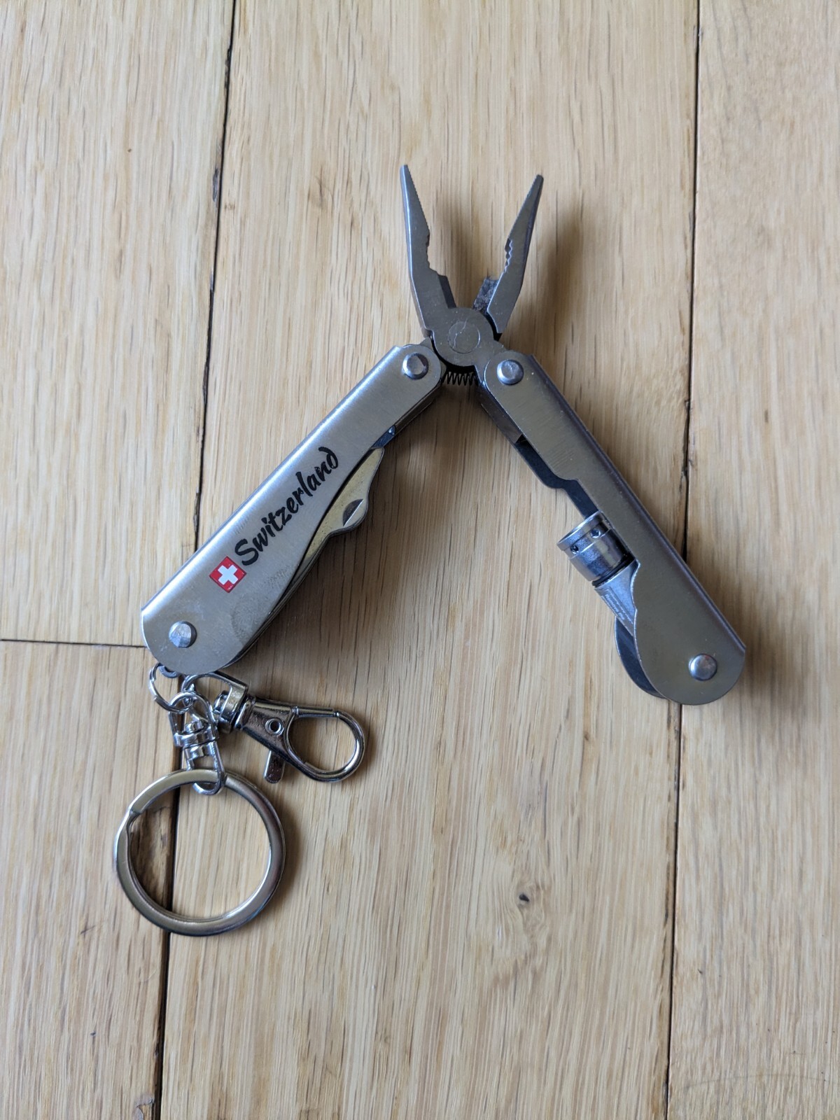 Swiss-Made Foldable Pocket Multi-Tool Stainless Steel w Pocket Clip. 8 Functions