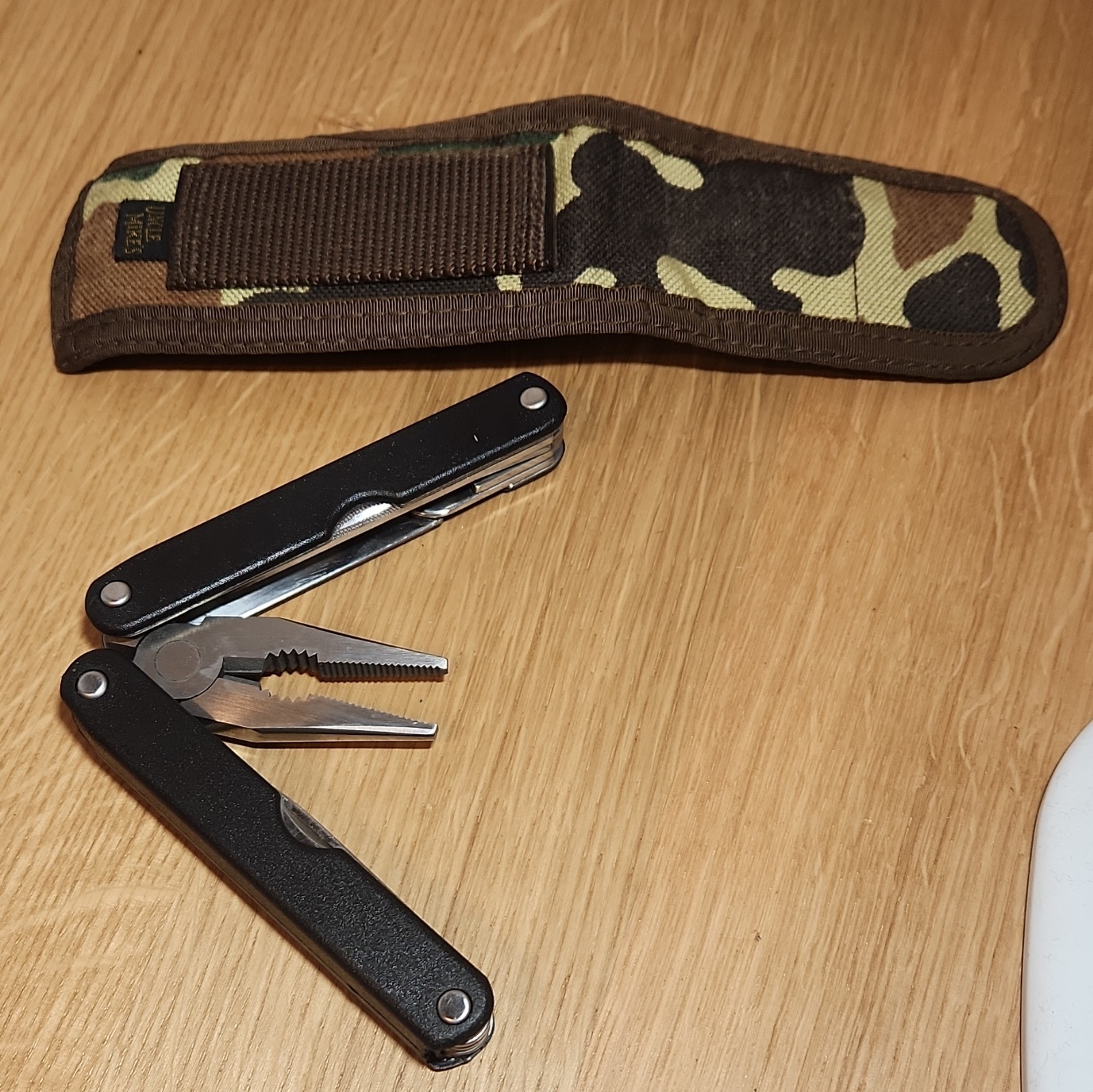 Mountain Quest 9-in-1 Folding Multi-Tool, Stainless 2in Blade, Camo Sheath