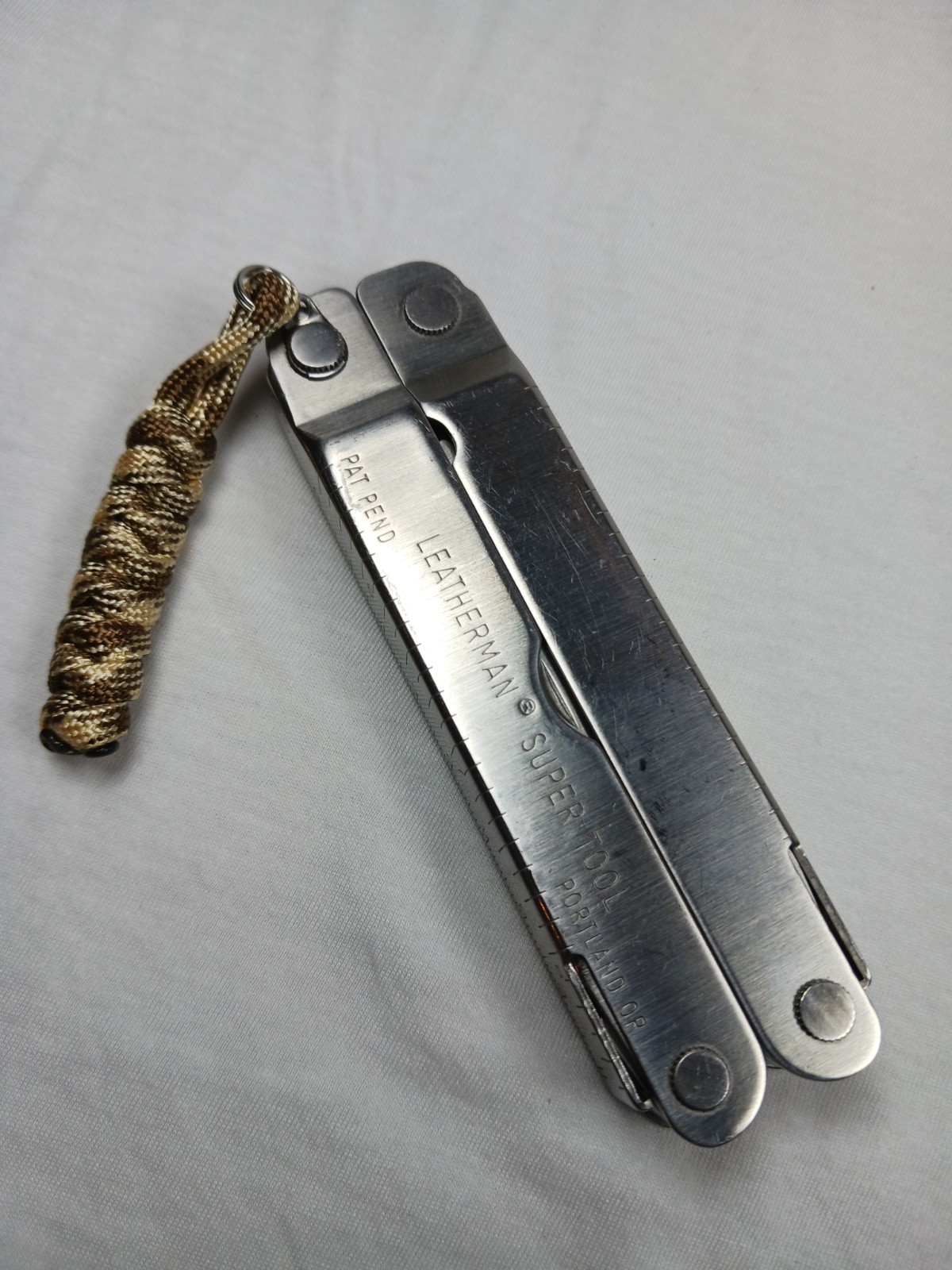 Leatherman Super Tool 100L 12-in-1 Stainless Multi-Tool Part Serrated w/ Sheath