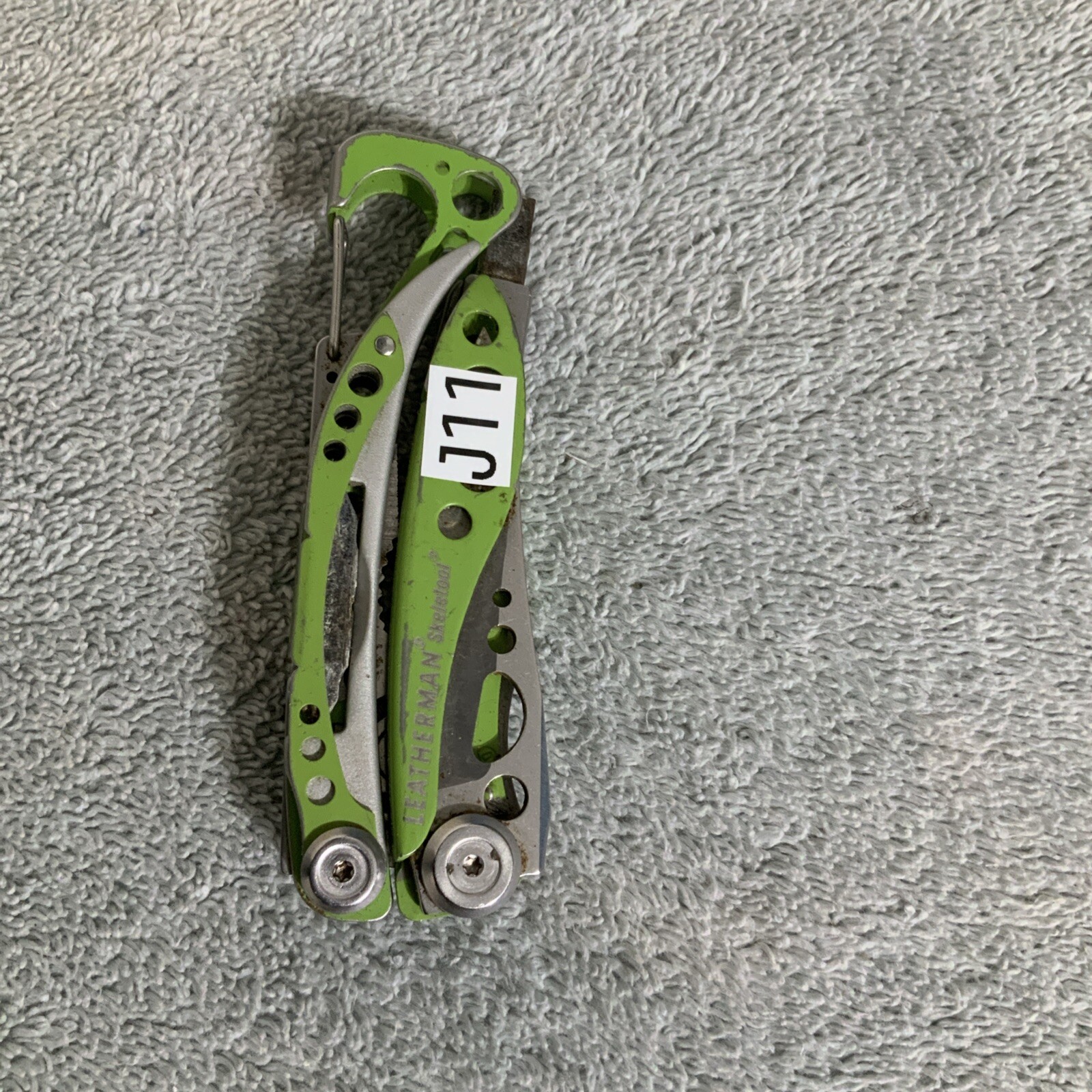 Retired Leatherman “Skeletool Lime Green” Stainless Steel Multi Tool Rust – J11