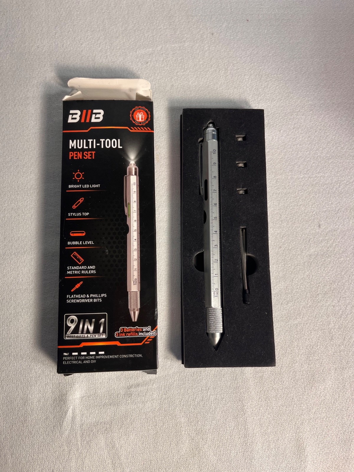 Unused Multi-tool Pen 9-in-1 functions with batteries and ink refills (in box)