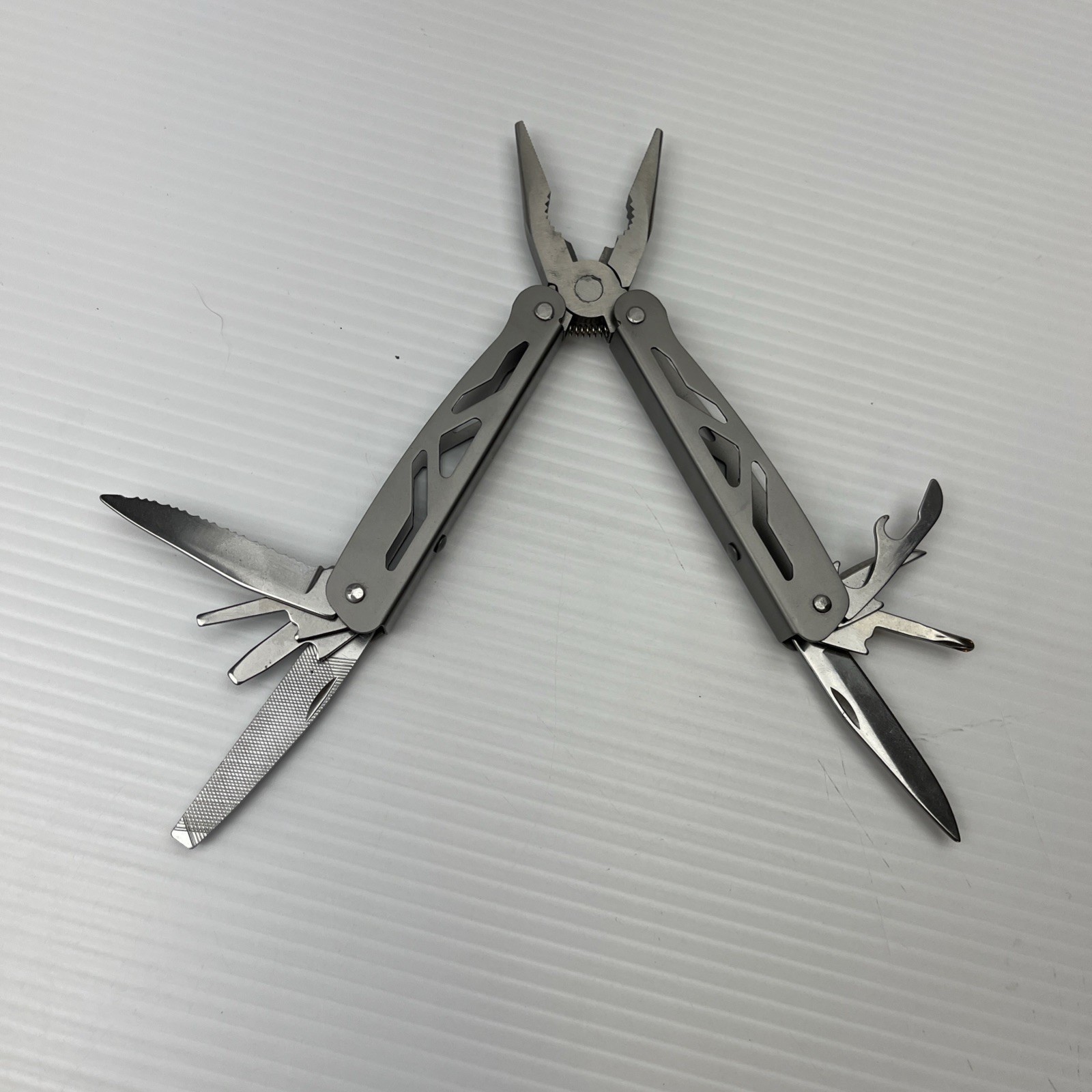 Multi Tool Pliers Knife File Saw Bottle Opener Survival Camping Gear