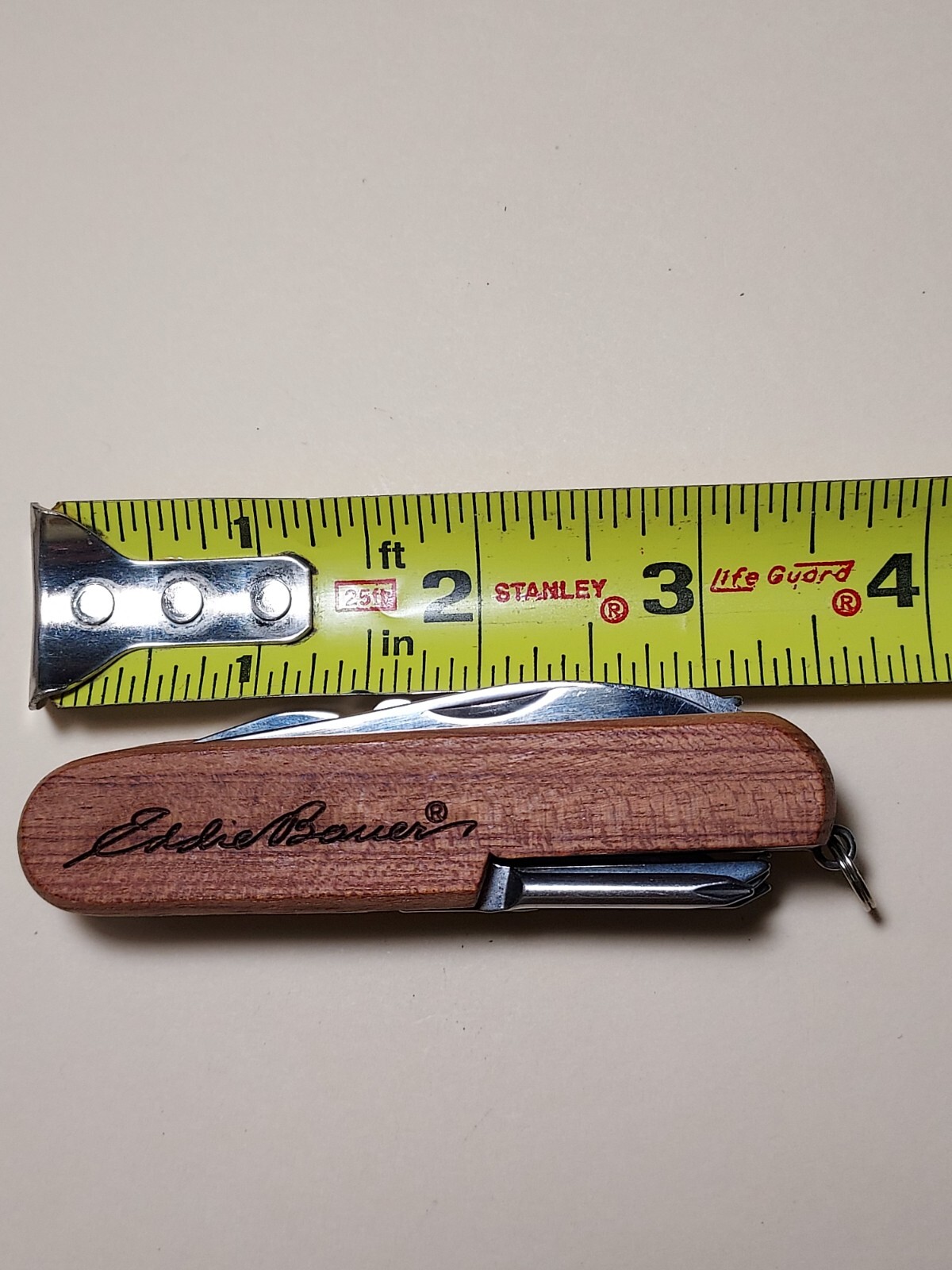 Eddie Bauer advertising Wood Handle Multi Tool *scissors needs repair*