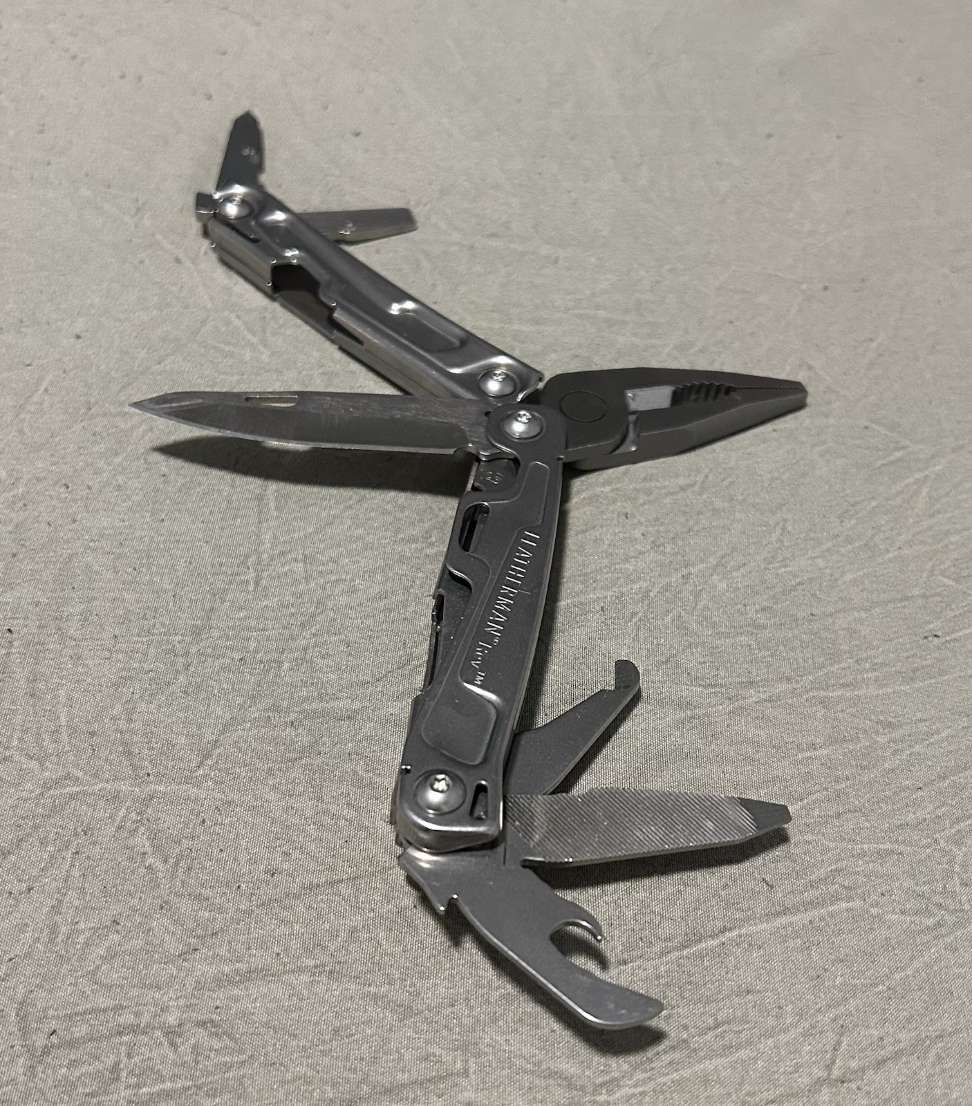 Leatherman 832127 Rev Stainless Steel Multi-tool With Pocket Clip