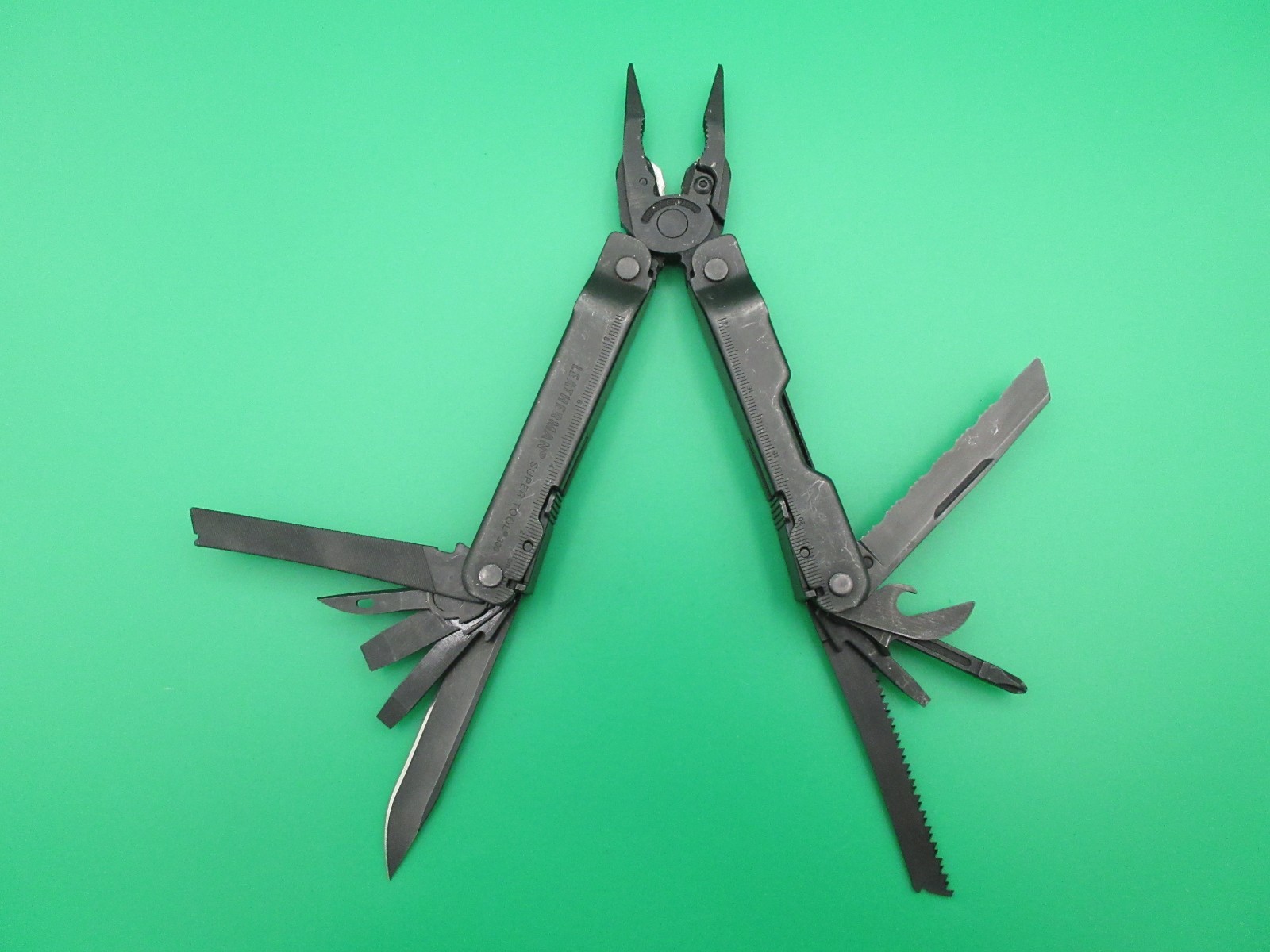 Leatherman Super Tool 300 Black Oxide Multi Tool Folding Knife USA #13A