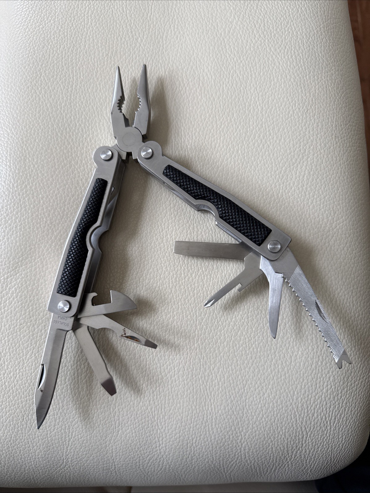 12-in-1 Stainless Steel Multitool with Rubber Handle