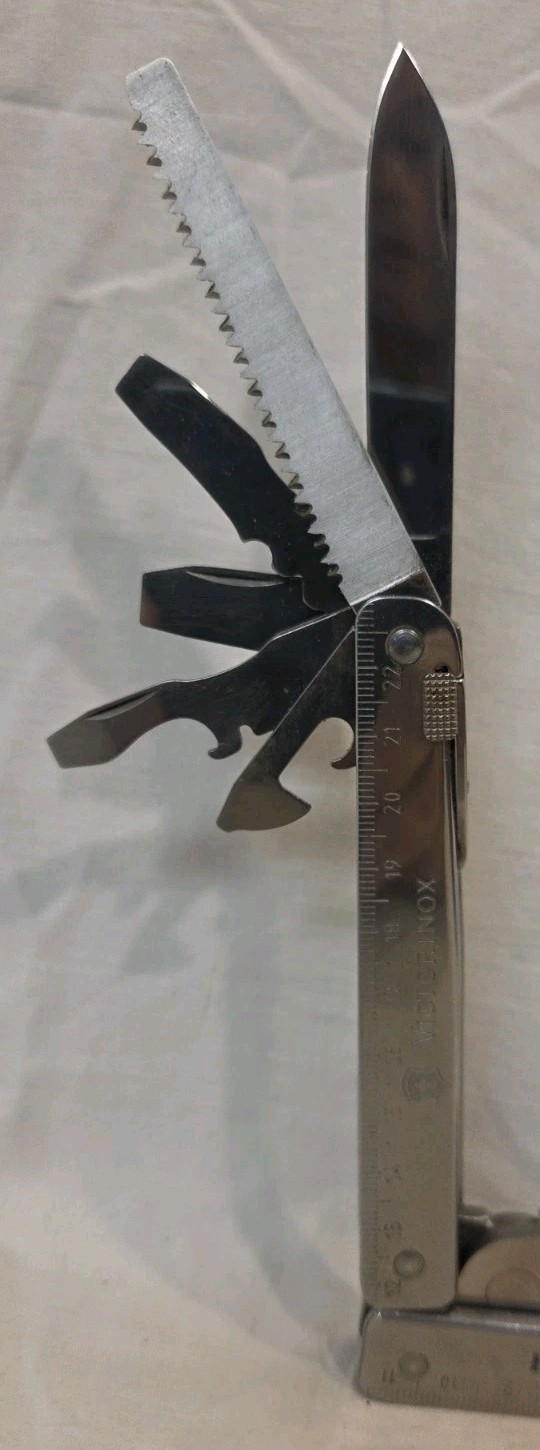 Victorinox SwissTool Swiss Army Knife Multi Tool Pliers, Ruler, Knife + used
